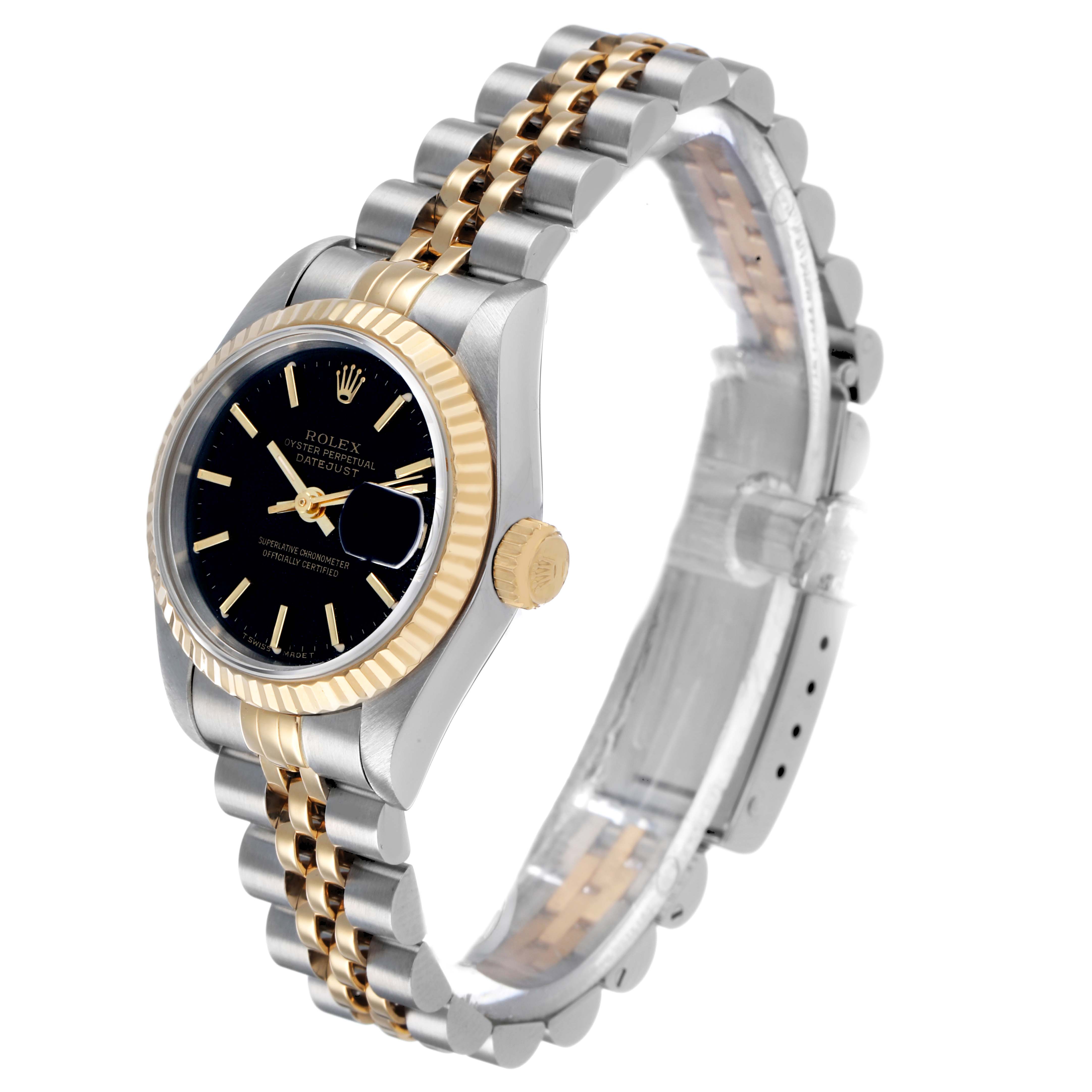 The Rolex Datejust 69173 Women's Steel and Gold (two tone) Black Dial watch is shown at a three-quarter angle, highlighting the dial, bezel, bracelet, and crown.
