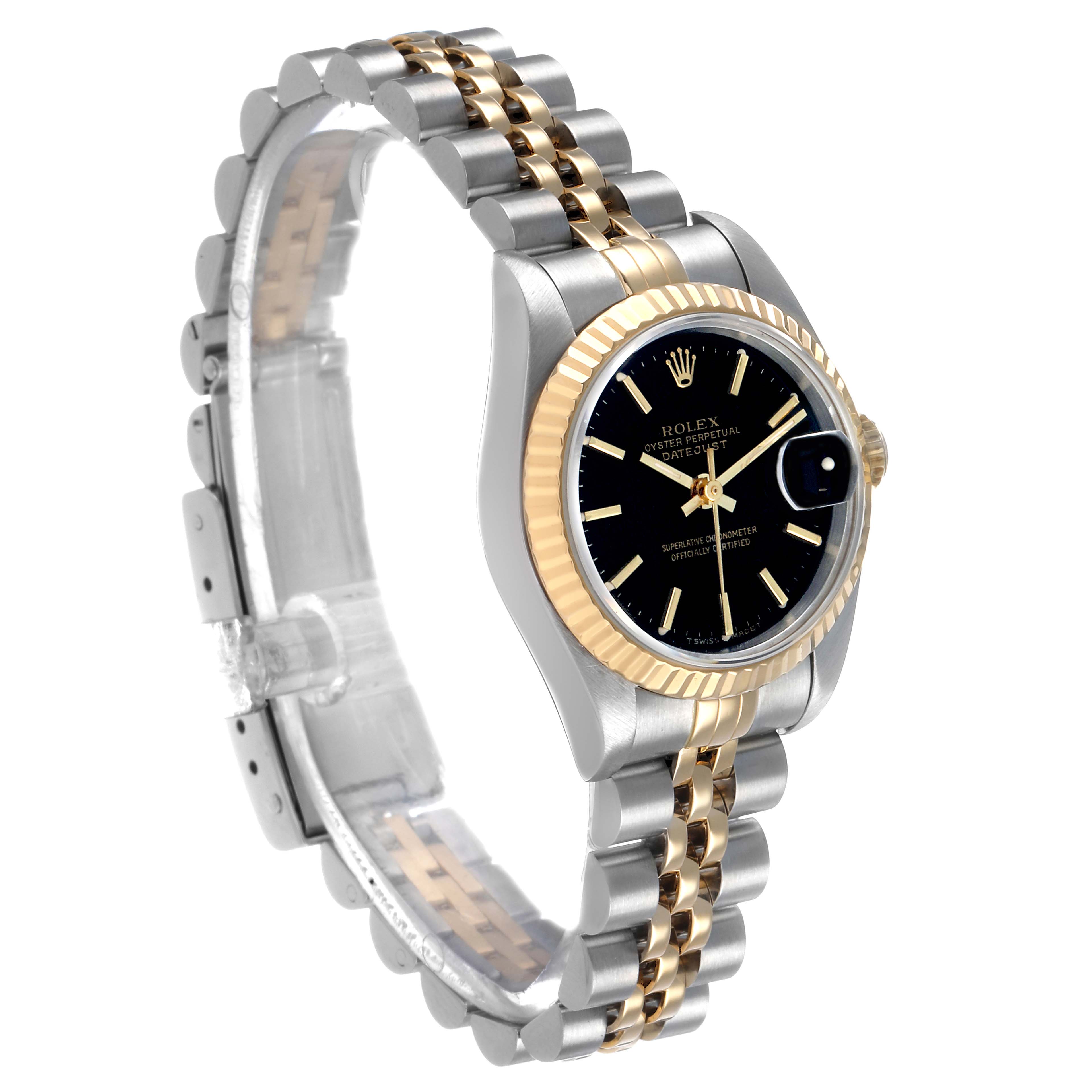 The Rolex Datejust 69173 Women's Steel and Gold (two tone) Black Dial watch is shown at a three-quarter angle, displaying the face, bezel, and part of the bracelet.