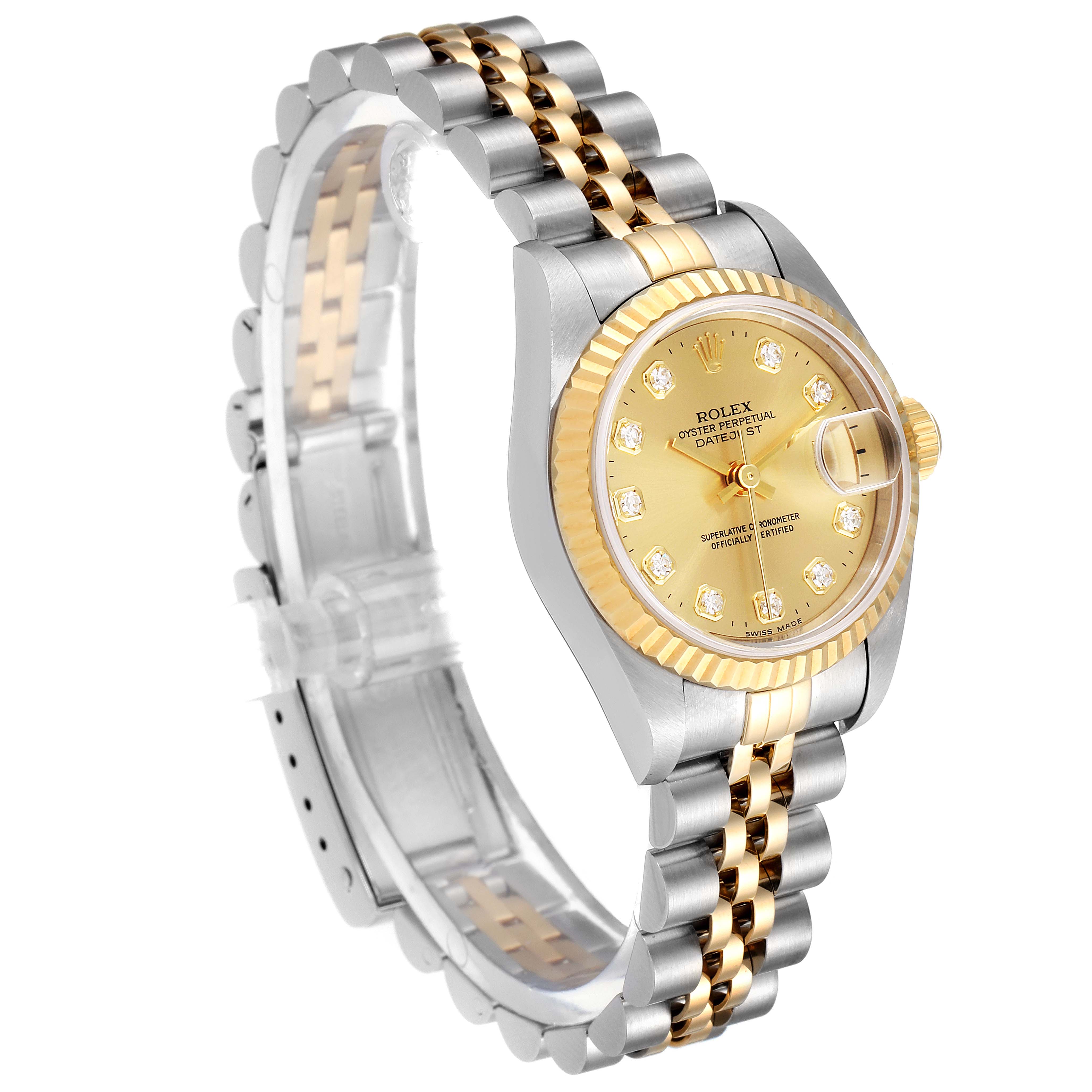 This image shows an angled view of a Rolex Datejust 79173 Women's Steel and Gold (two tone) Champagne Dial 79173 Women's Steel and Gold (two tone) Champagne Dial, displaying its two-tone bracelet, gold bezel, and diamond-accented dial.