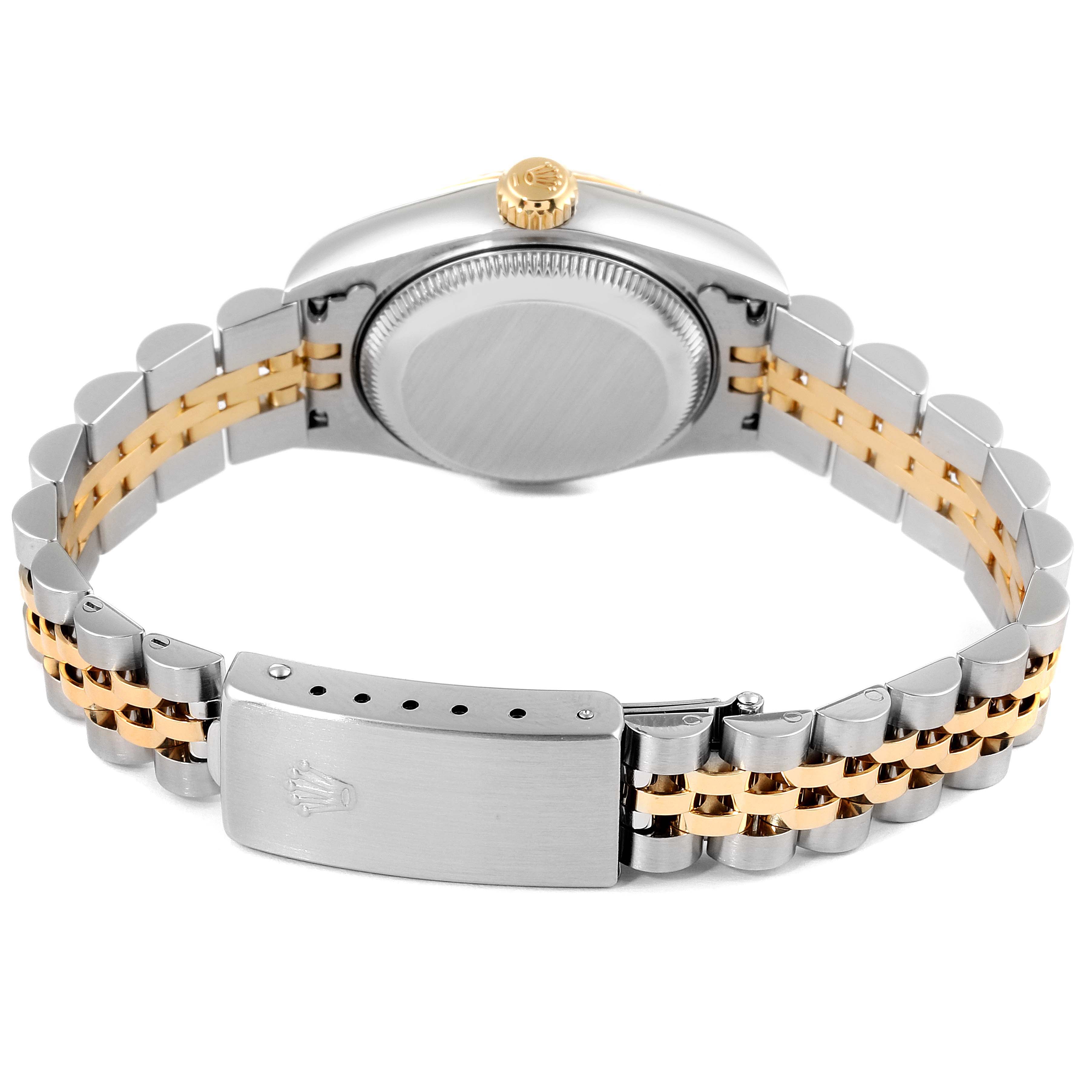 The image shows the back view of a Rolex Datejust 79173 Women's Steel and Gold (two tone) Champagne Dial 79173 Women's Steel and Gold (two tone) Champagne Dial watch, highlighting its two-tone metal bracelet and clasp.