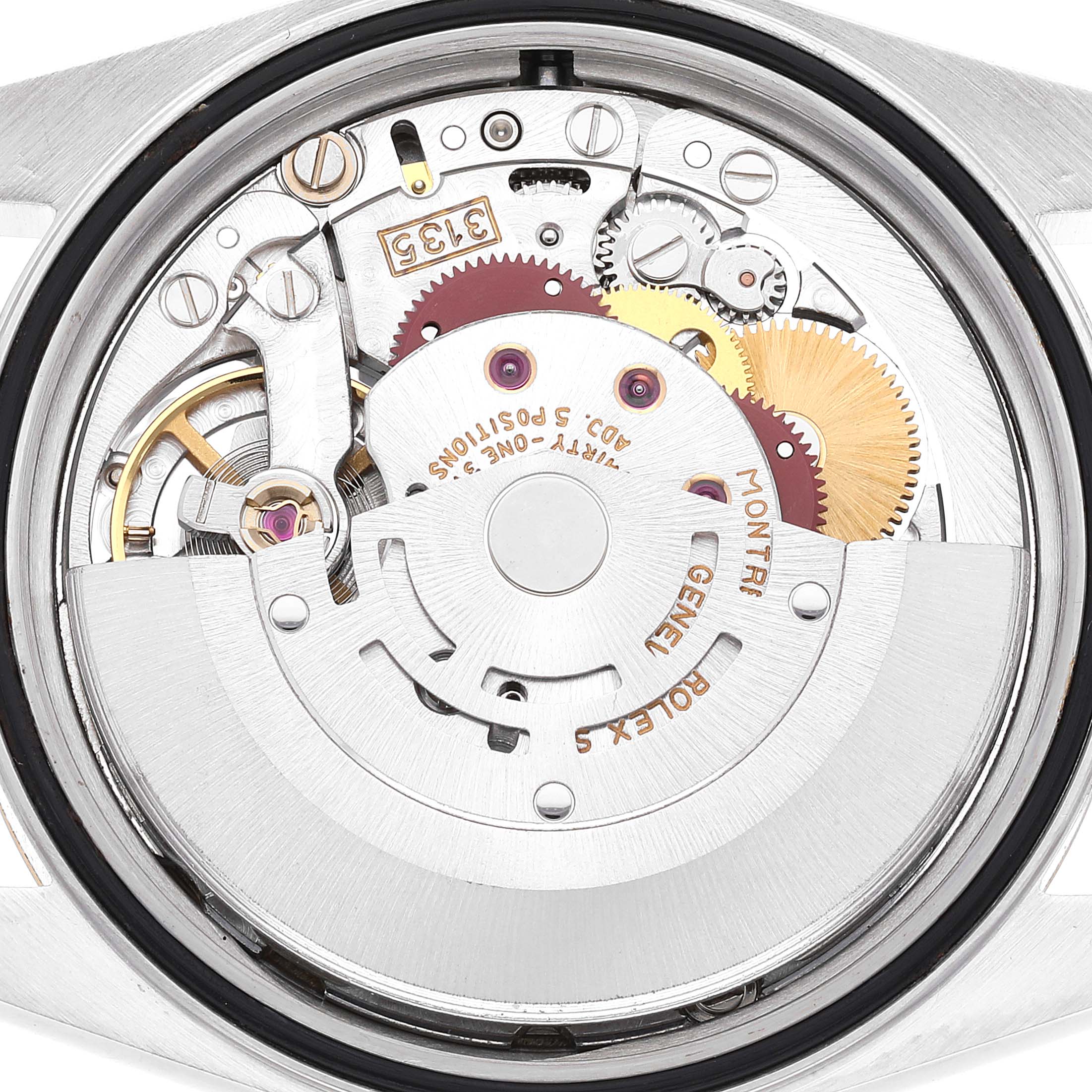 This image shows the movement of the Rolex Datejust 16233 Men's Steel and Gold (two tone) Champagne Dial 16233 Men's Steel and Gold (two tone) Champagne Dial watch from the back, highlighting its intricate mechanical parts.