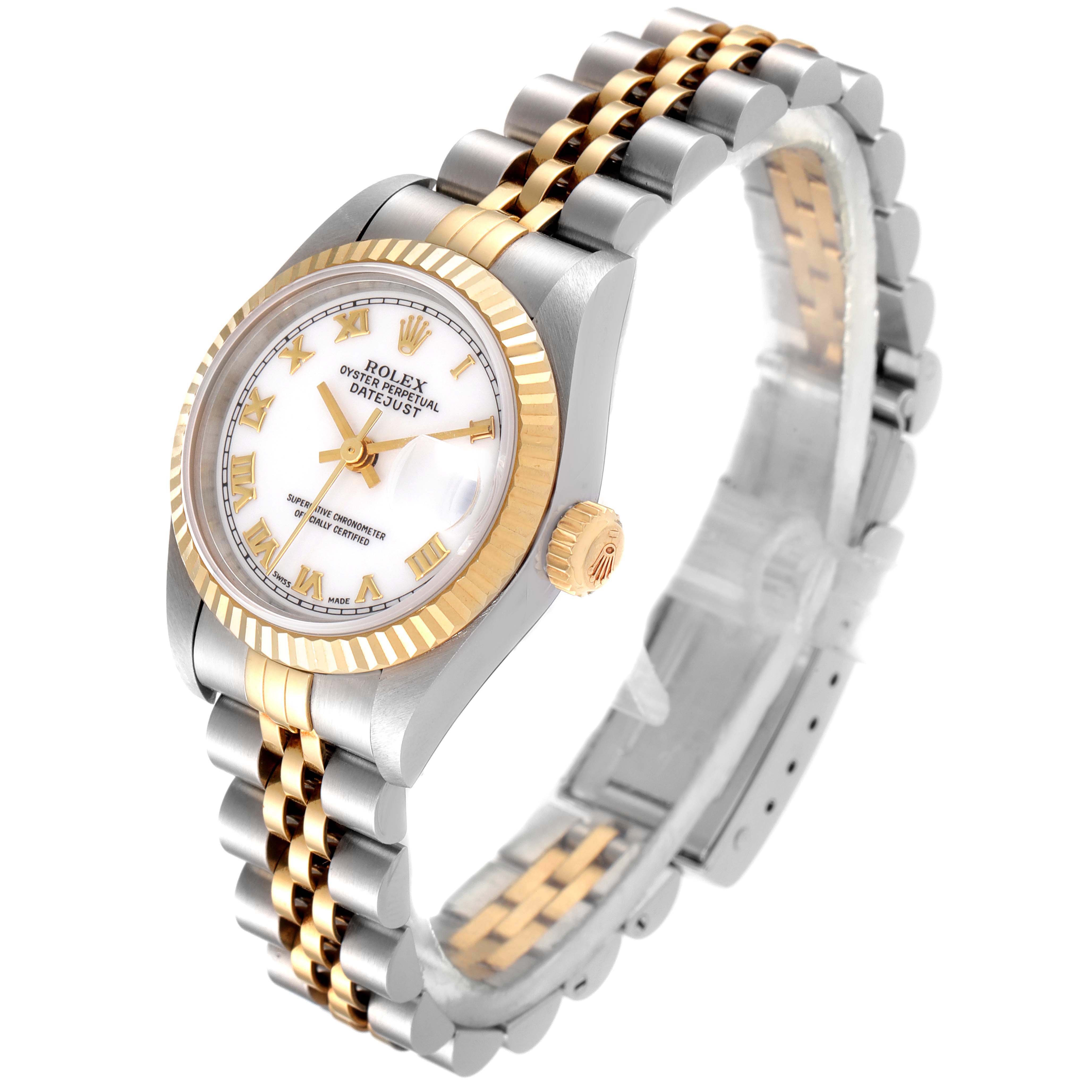 The Rolex Datejust 69173 Women
s Stainless Steel White Dial 69173 Women
s Stainless Steel White Dial watch is shown at a slight angle, displaying its face, fluted bezel, crown, and two-tone bracelet.