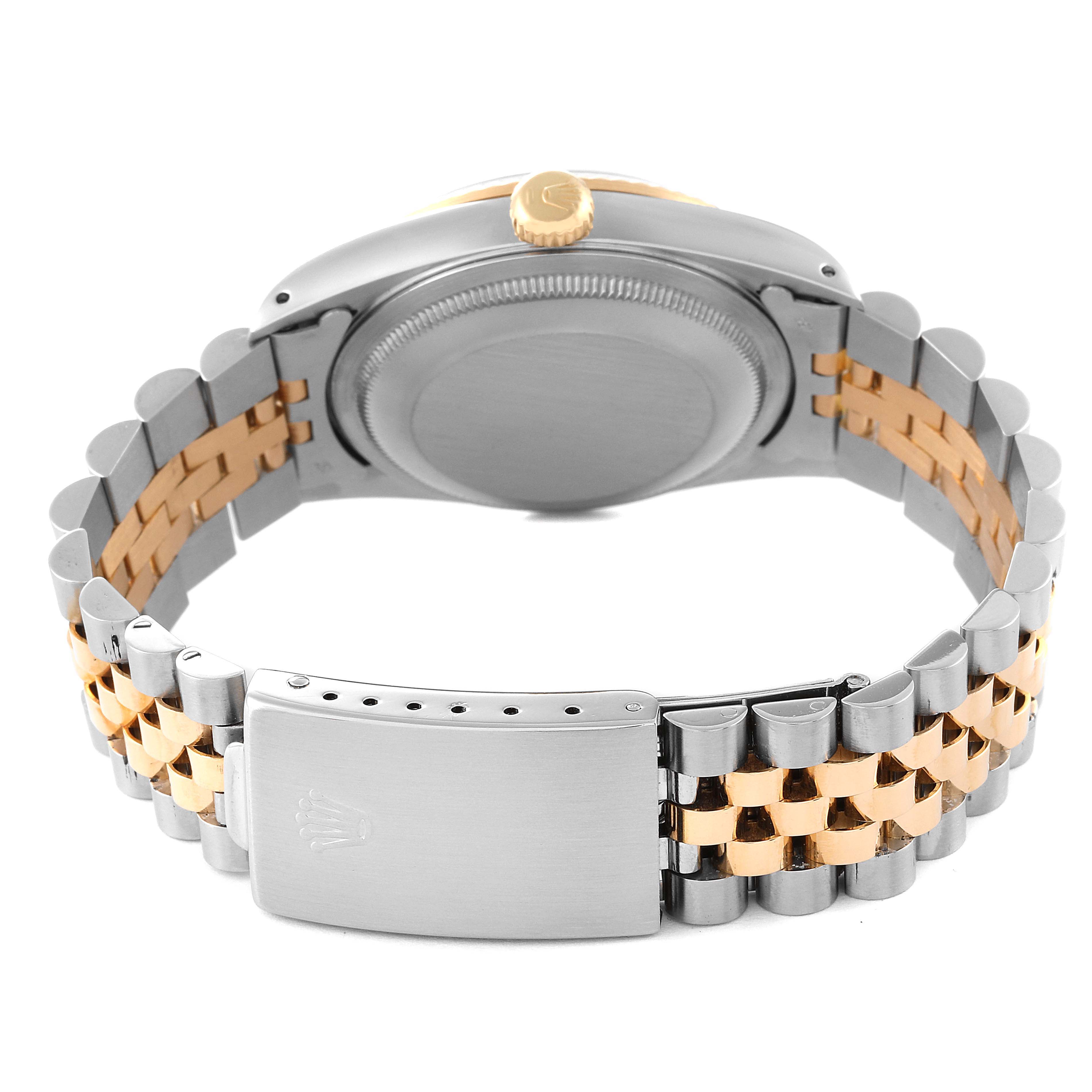 The image shows the back of the Rolex Datejust 16233 Men's Steel and Gold (two tone) Silver Dial 16233 Men's Steel and Gold (two tone) Silver Dial watch, highlighting the bracelet, clasp, and case.