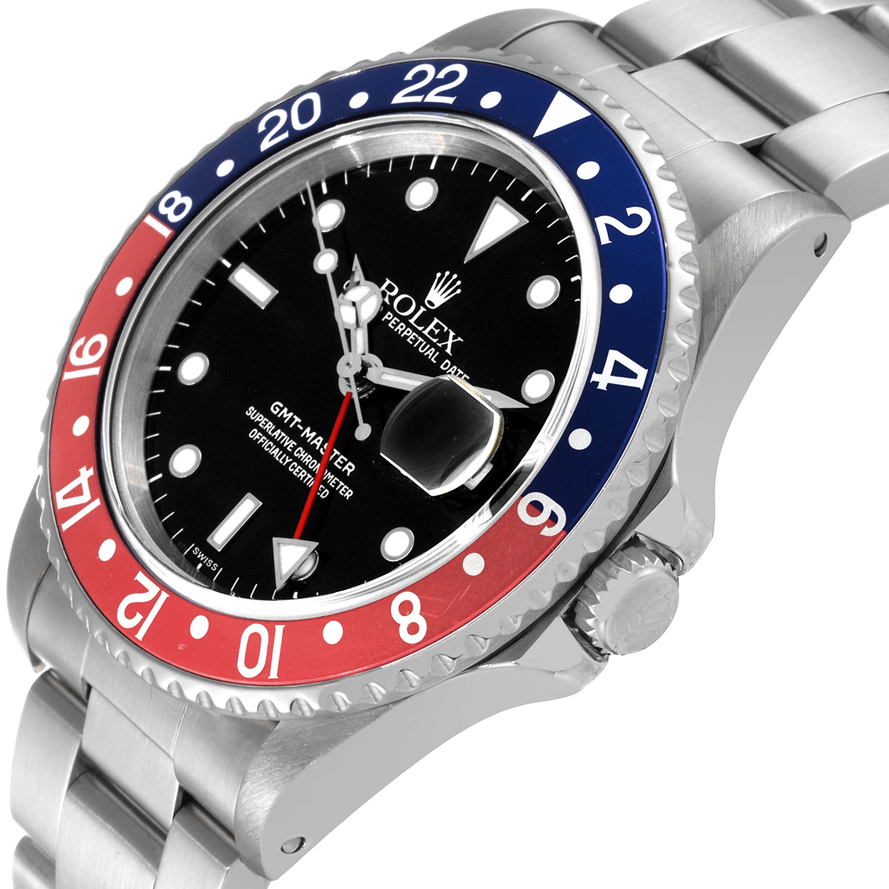 The image shows a close-up angle of a Rolex GMT-Master 16700 Men
s Stainless Steel Black Dial 16700 Men
s Stainless Steel Black Dial watch with its bezel, dial, crown, and part of the bracelet visible.
