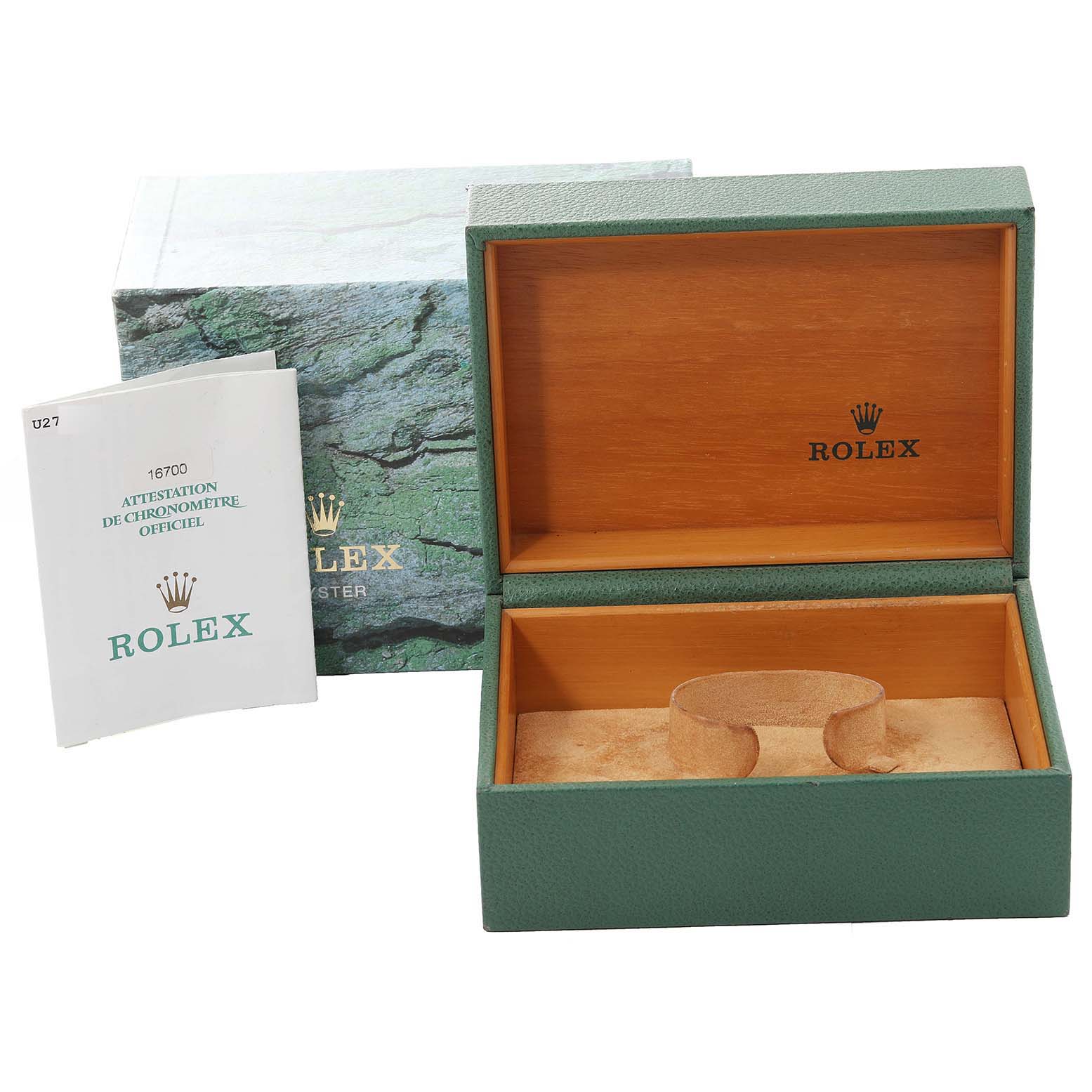 This image shows an open Rolex GMT-Master 16700 Men
s Stainless Steel Black Dial 16700 Men
s Stainless Steel Black Dial watch box, booklet, and outer box at an eye-level angle.