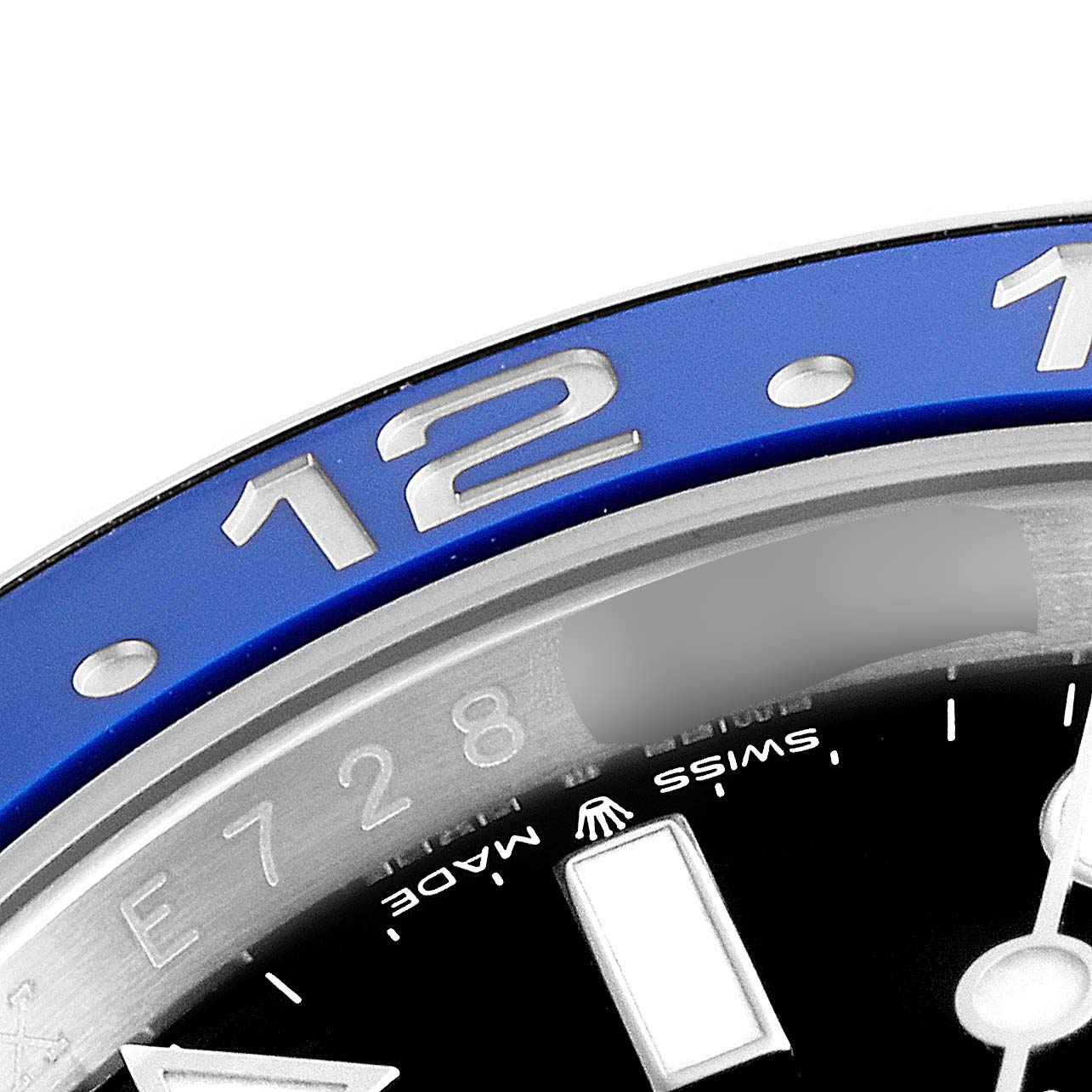 This close-up image shows the bezel and part of the dial of a Rolex GMT-Master 126710 Men
s Stainless Steel Black Dial 126710 Men
s Stainless Steel Black Dial watch.