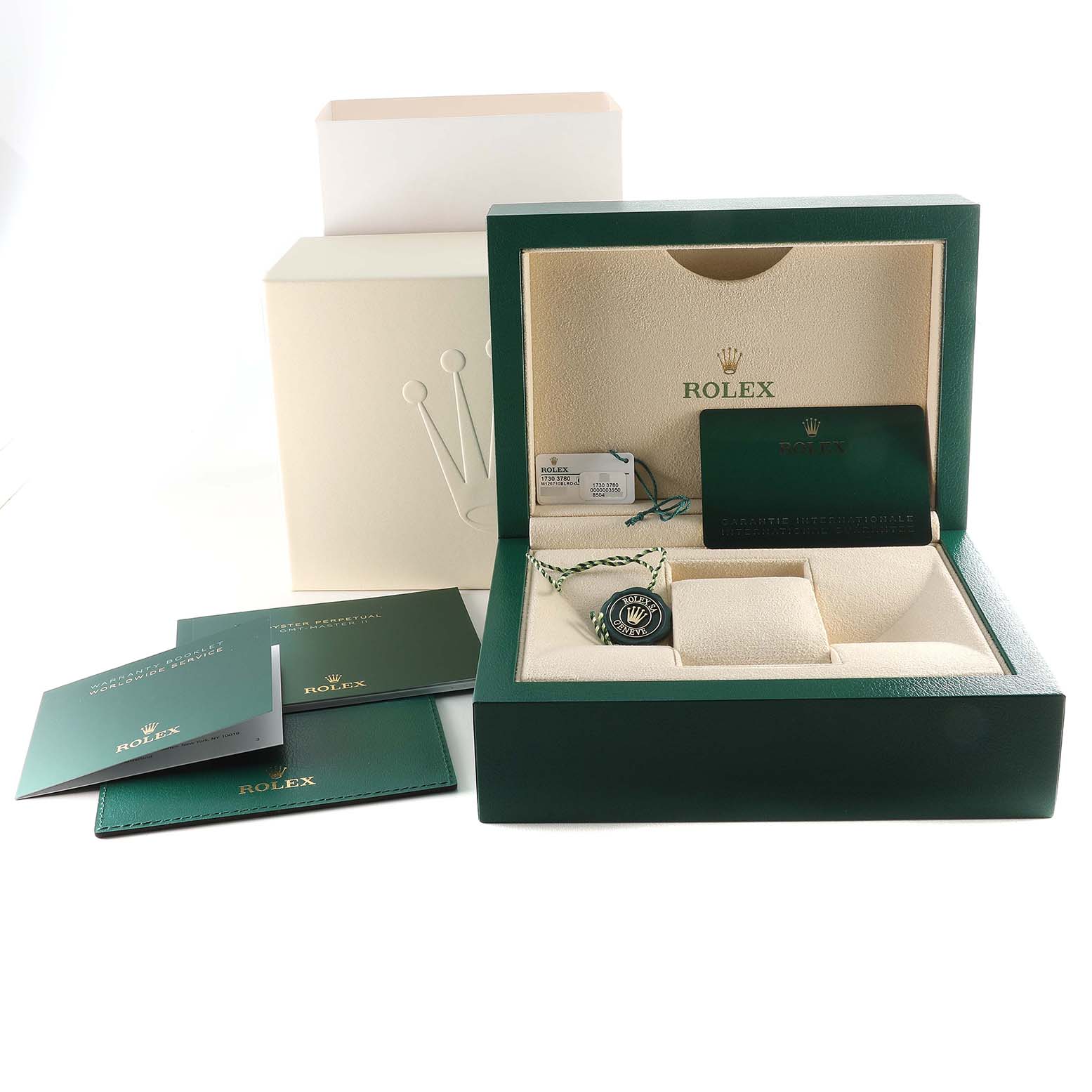 The image shows the open box, papers, and tags of a Rolex GMT-Master 126710BLRO Men
s Stainless Steel Black Dial 126710BLRO Men
s Stainless Steel Black Dial watch, displayed from a front angle.