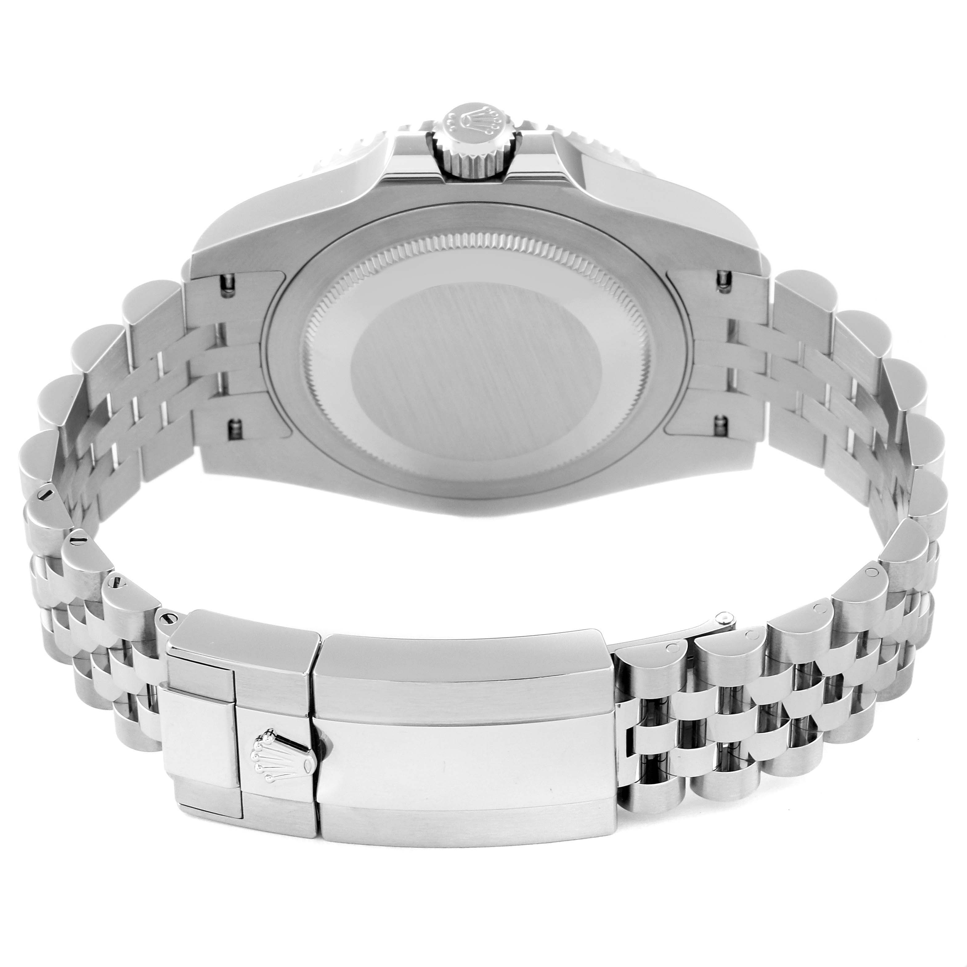 The image shows the rear view of a Rolex GMT-Master 126710BLRO Men
s Stainless Steel Black Dial 126710BLRO Men
s Stainless Steel Black Dial watch, highlighting the case back, crown, and bracelet clasp.