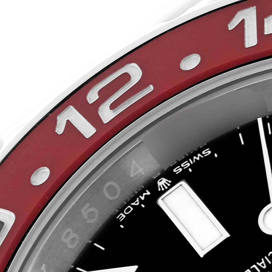 This image shows a close-up of the bezel and part of the dial on a Rolex GMT-Master 126710BLRO Men
s Stainless Steel Black Dial 126710BLRO Men
s Stainless Steel Black Dial watch.