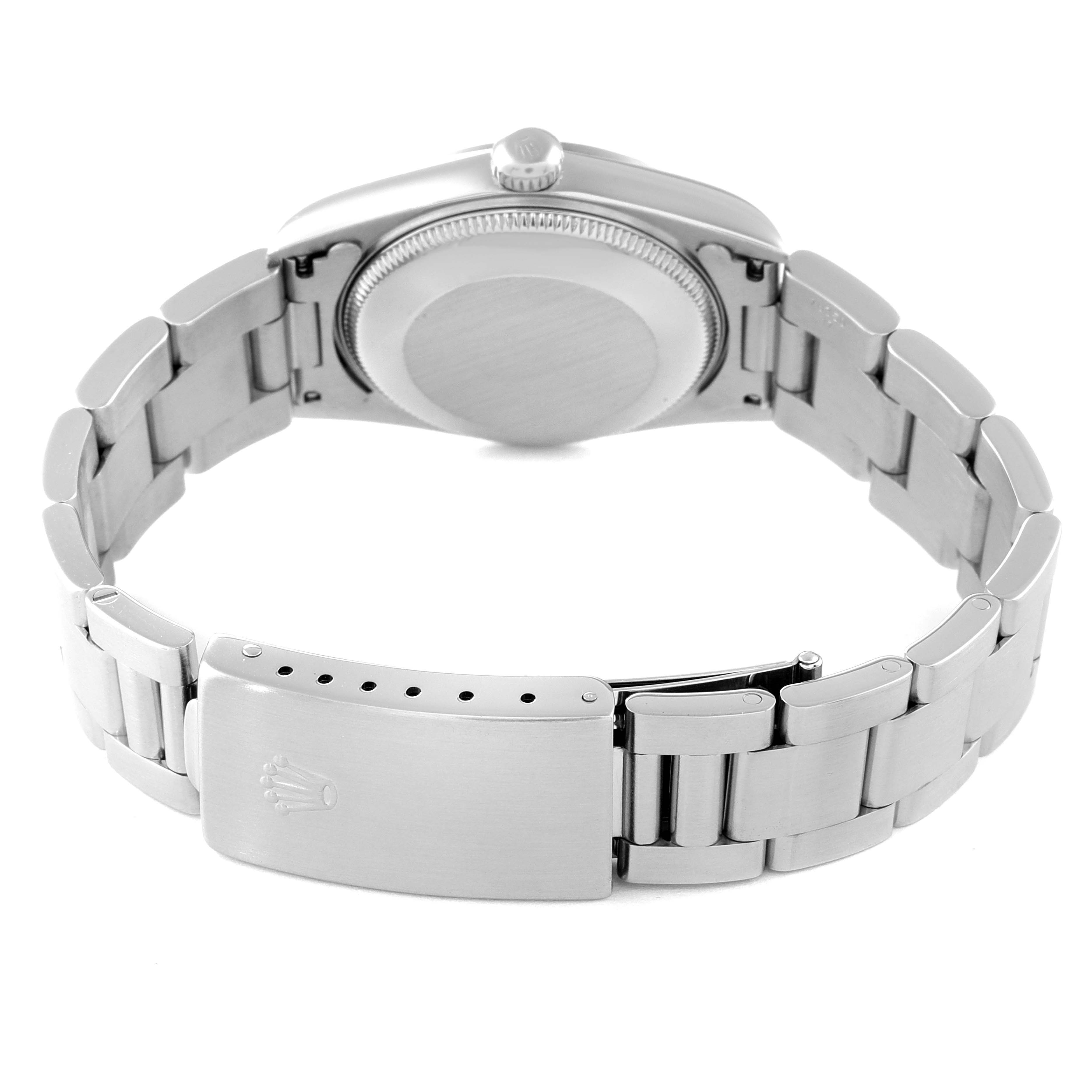 This Rolex Mid-Size 77080 Women's Stainless Steel Pink Dial 77080 Women's Stainless Steel Pink Dial watch is shown from the back, displaying the case back and closed clasp of the bracelet.