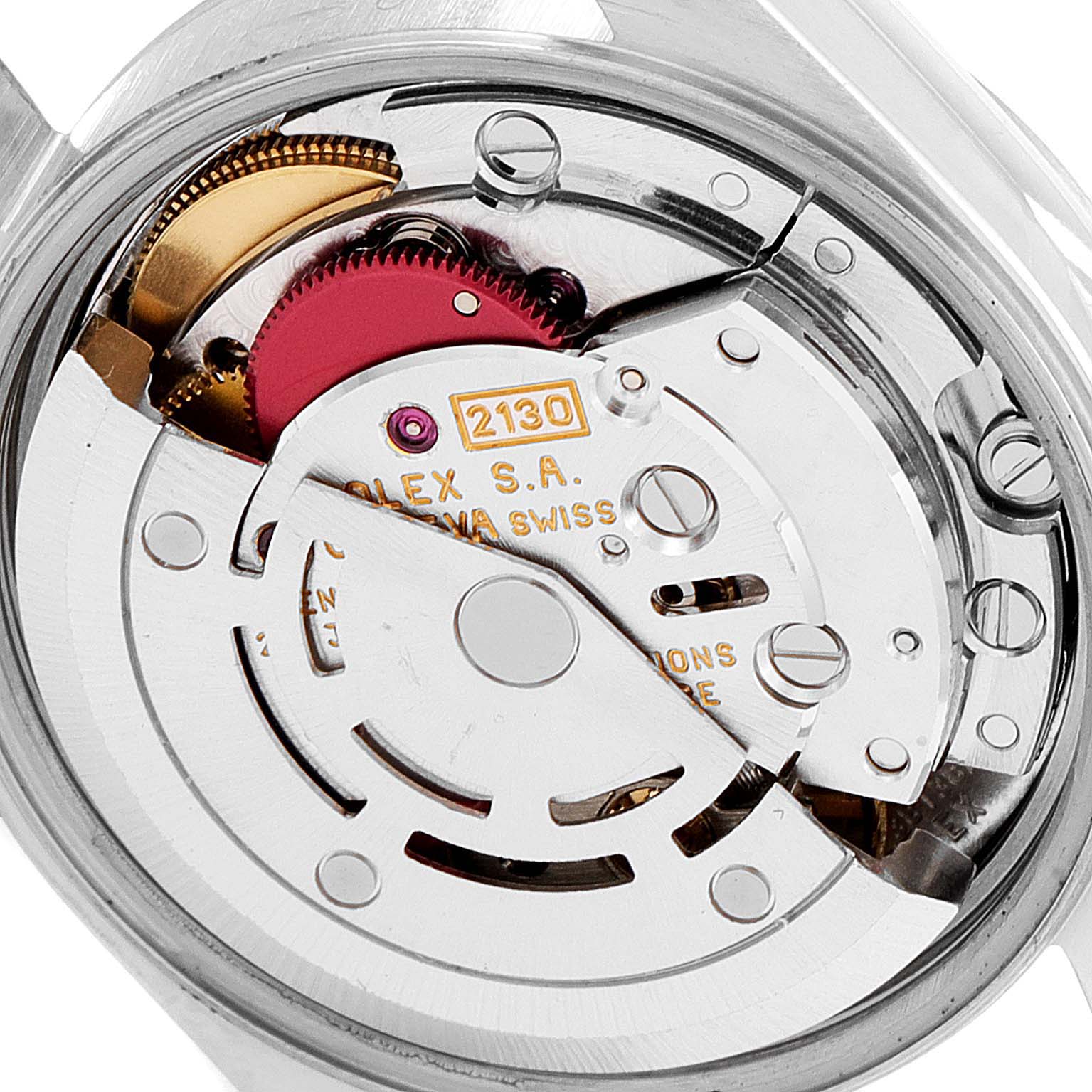 This image shows the internal movement mechanism of a Rolex Oyster Perpetual 67230 Women's Stainless Steel Black Dial 67230 Women's Stainless Steel Black Dial watch, viewed from the back.