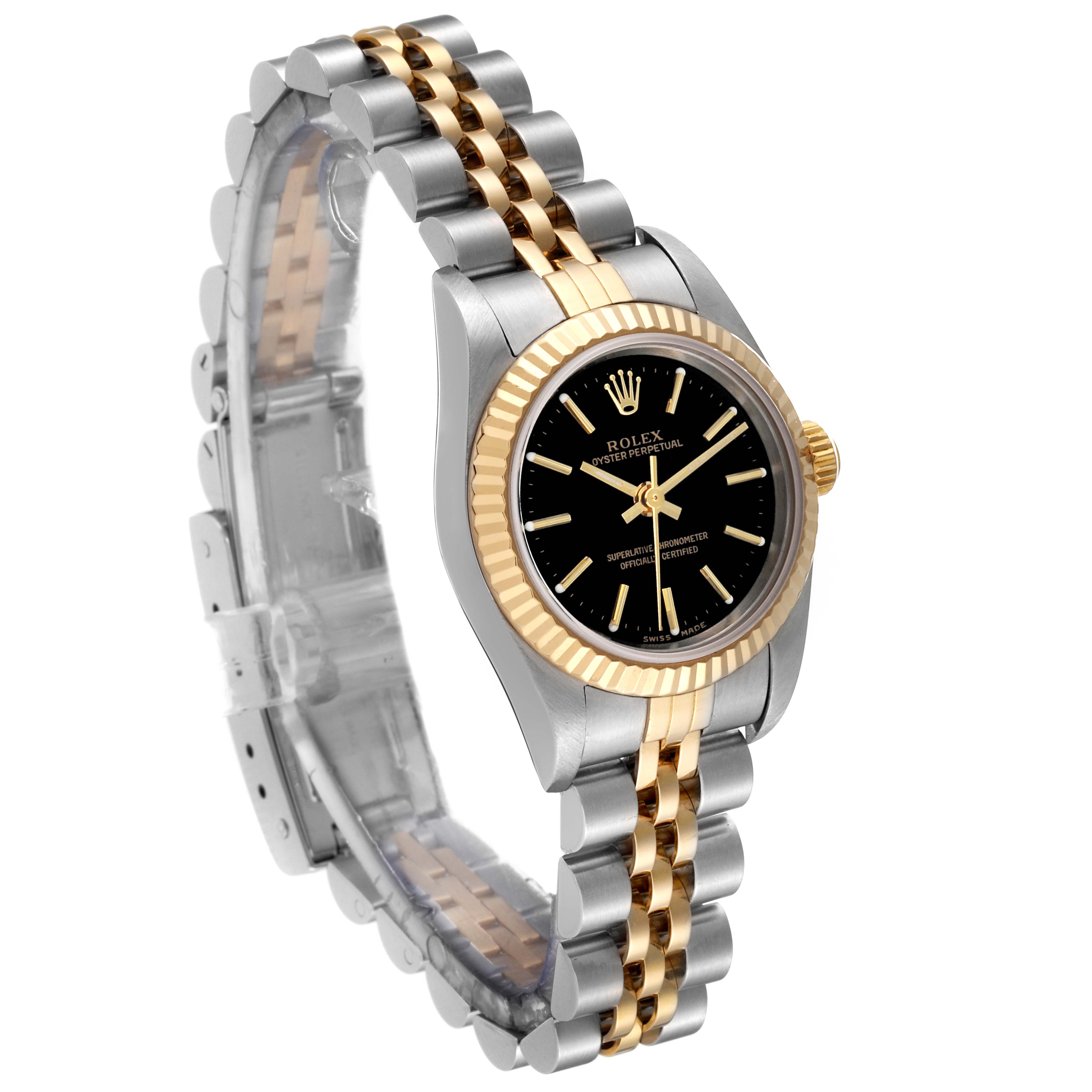 The image shows a side angle of a Rolex Oyster Perpetual 76193 Women's Steel and Gold (two tone) Black Dial 76193 Women's Steel and Gold (two tone) Black Dial watch, highlighting its two-tone bracelet, black dial, and gold bezel.