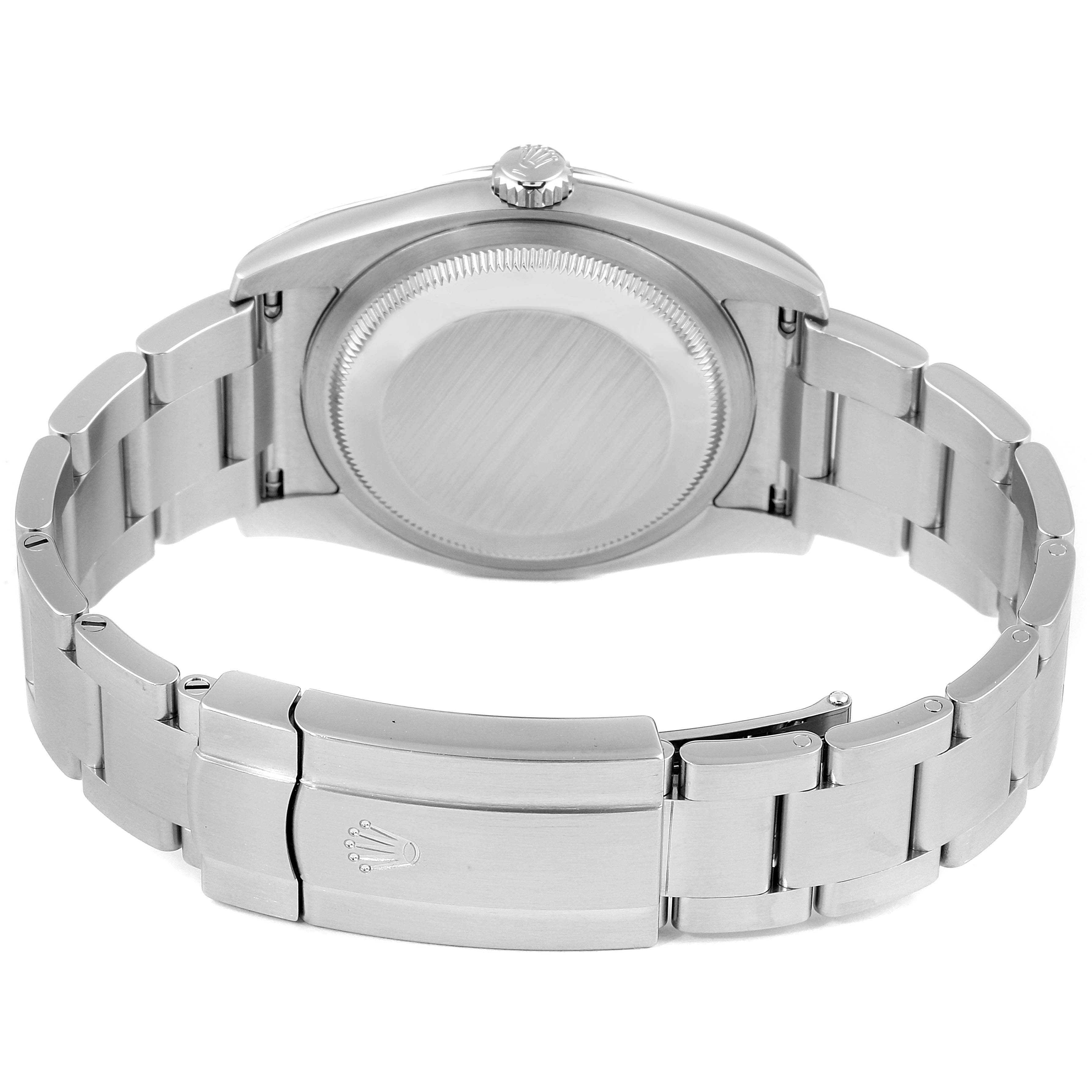 This image shows the back case and bracelet of a Rolex Oyster Perpetual 116000 Men's Stainless Steel Blue Dial 116000 Men's Stainless Steel Blue Dial watch.