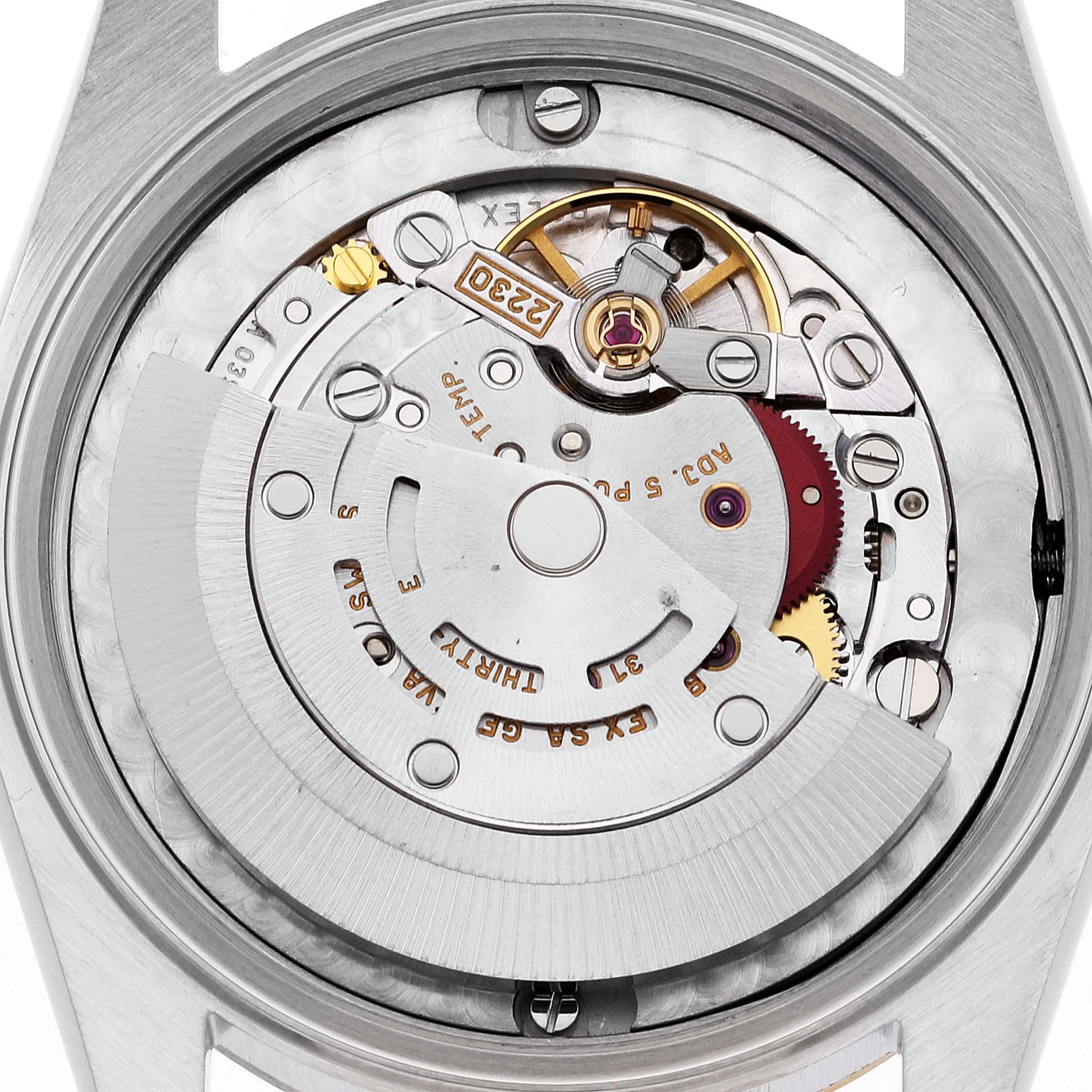 This image shows an internal view of the Rolex Mid-Size 77483 Women's Steel and Gold (two tone) Grey Dial 77483 Women's Steel and Gold (two tone) Grey Dial model watch, focusing on its mechanical movement and rotor.