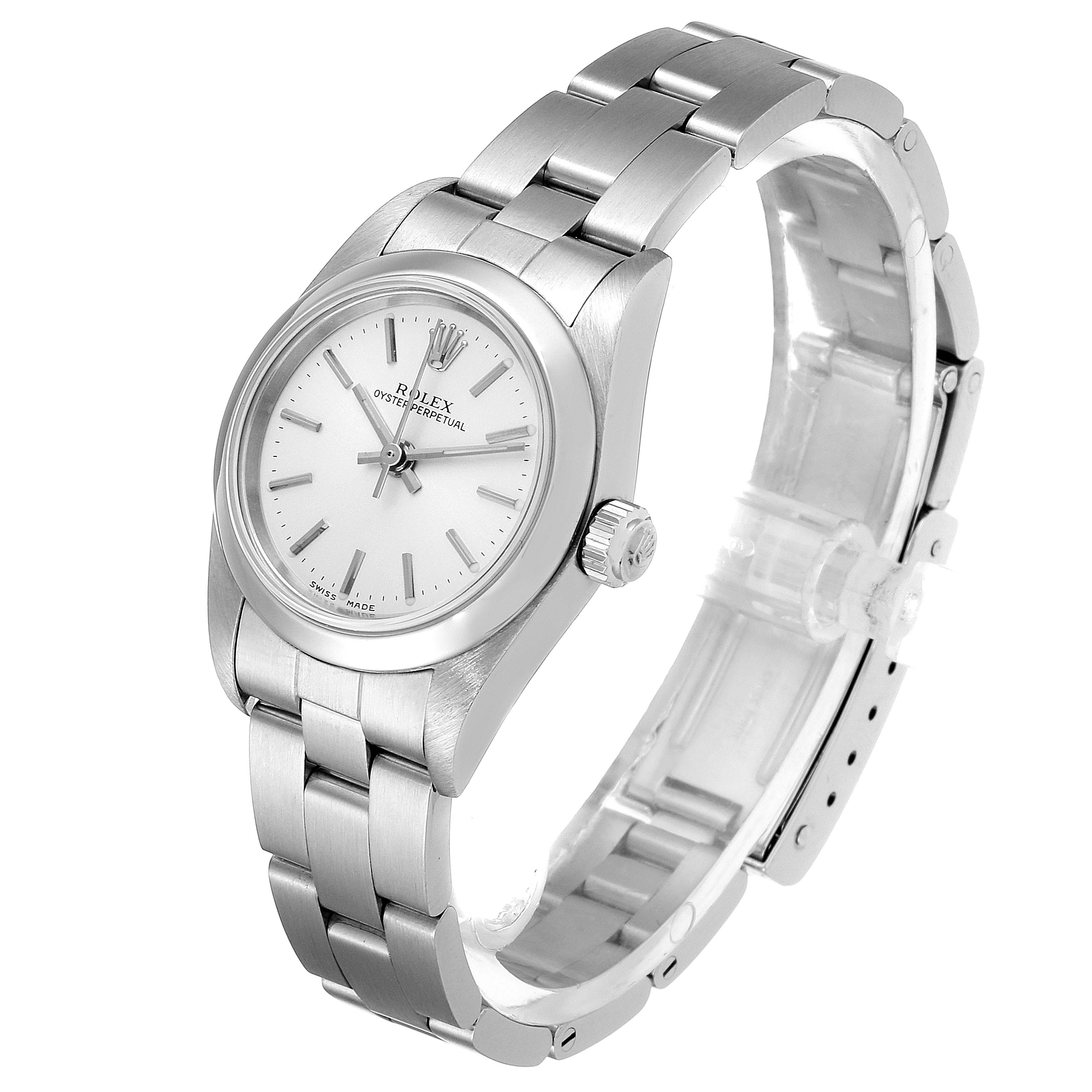 This image shows a side view of a Rolex Oyster Perpetual 76080 Women's Stainless Steel Silver Dial 76080 Women's Stainless Steel Silver Dial watch, displaying the face, bezel, crown, and stainless steel bracelet.