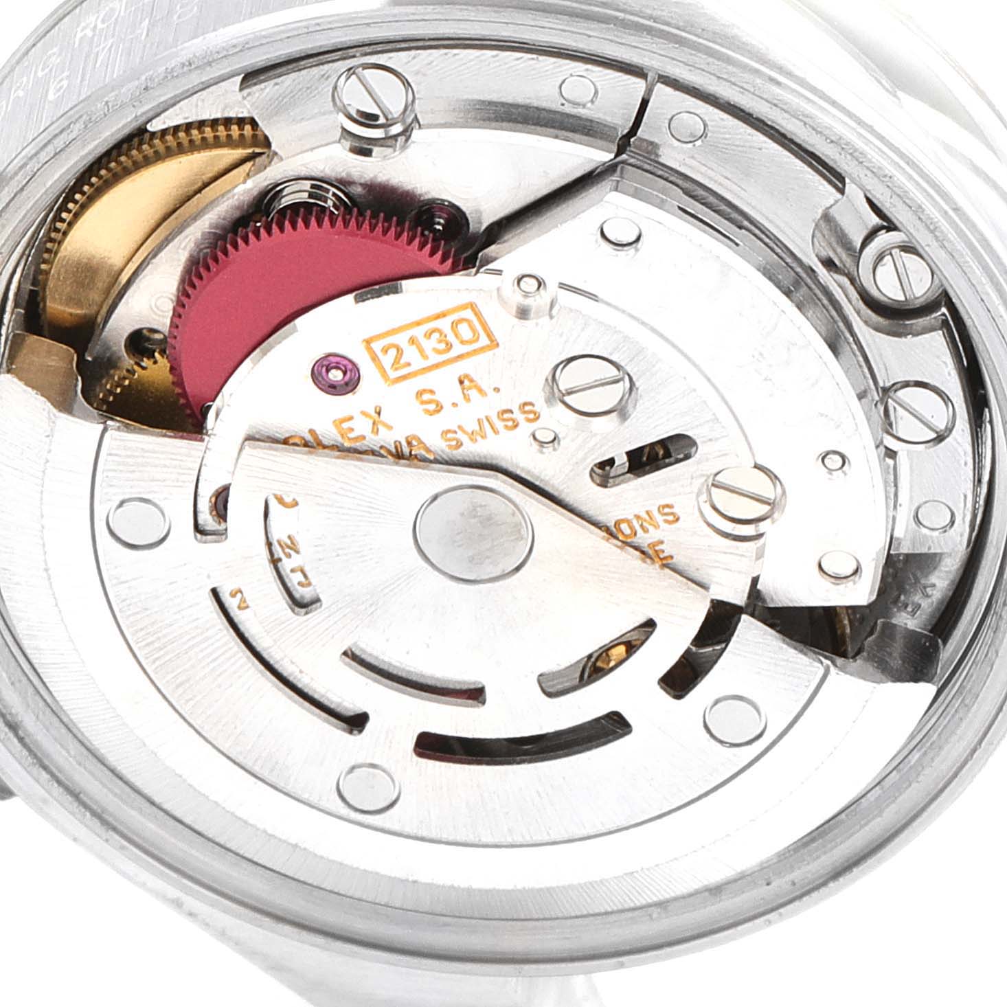 This image shows a close-up of the internal mechanism of a Rolex Oyster Perpetual 67180 Women
s Stainless Steel Black Dial 67180 Women
s Stainless Steel Black Dial watch, highlighting its intricate components.