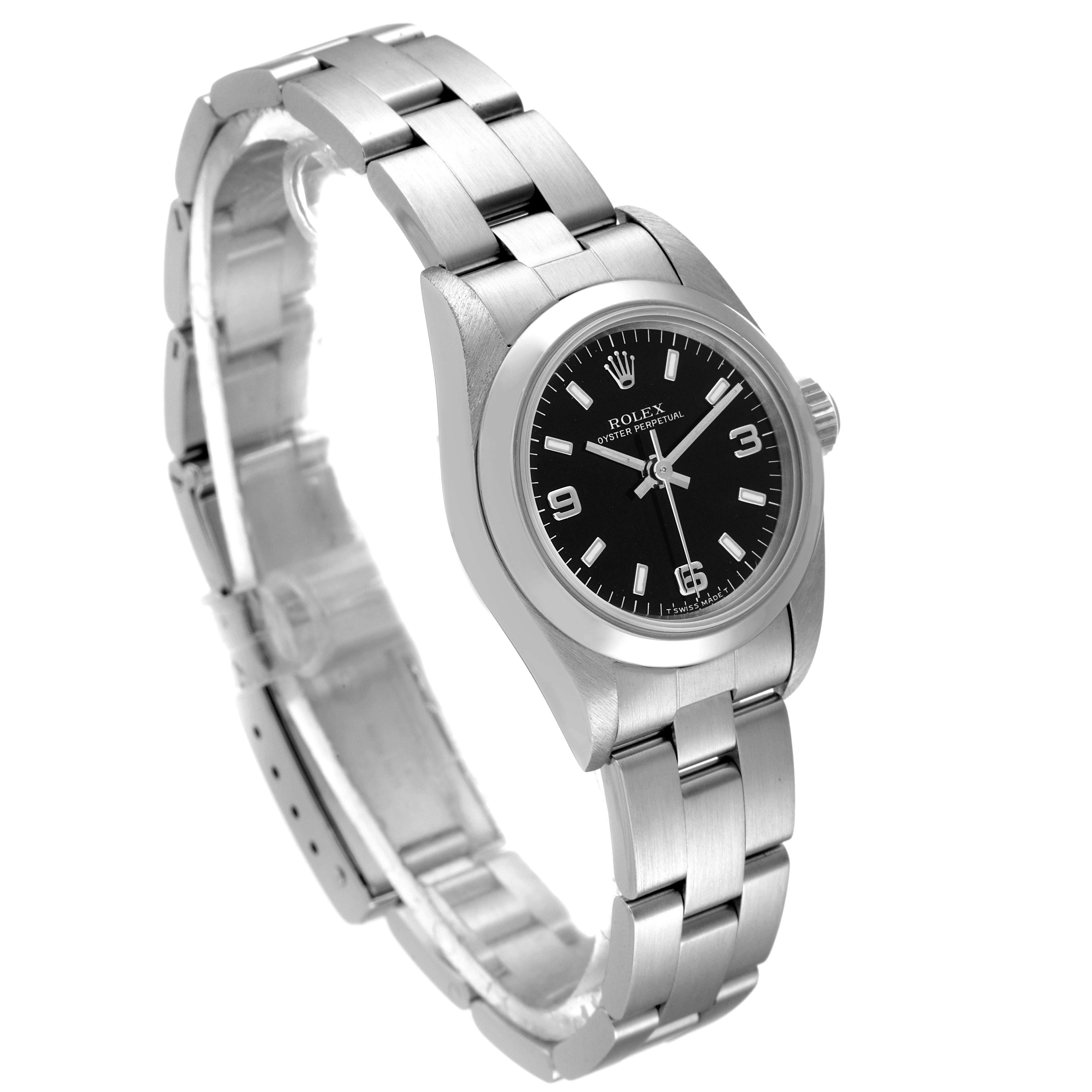 The image shows a side-angle view of a Rolex Oyster Perpetual 67180 Women
s Stainless Steel Black Dial 67180 Women
s Stainless Steel Black Dial watch, highlighting the face, bezel, and bracelet.