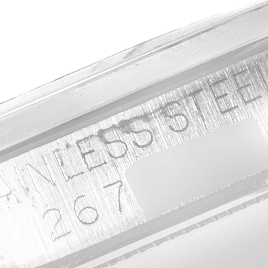 This is a close-up of the engraved case back or inner side of the case of the Vintage Collection model by Rolex.