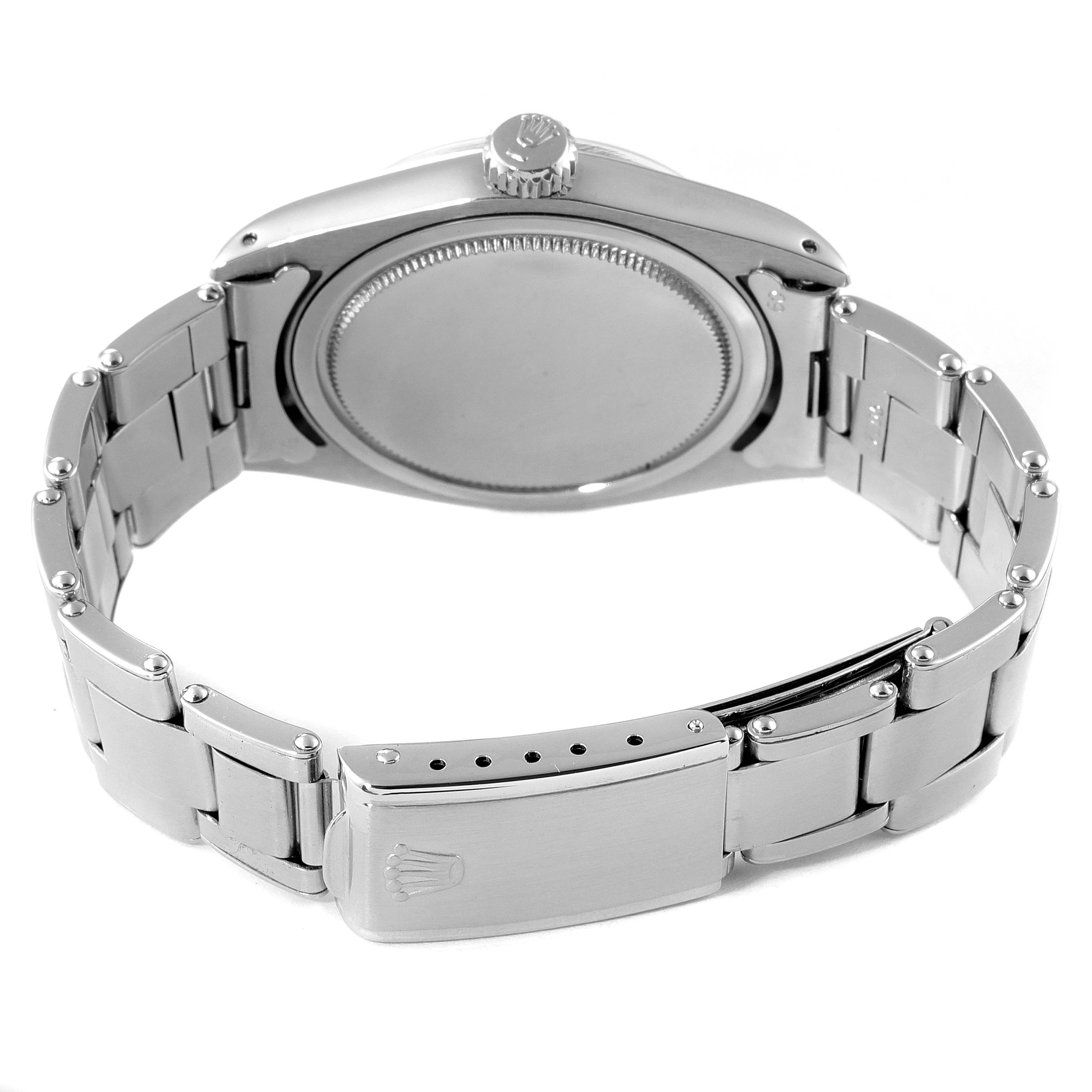 The image shows the back case and bracelet clasp of a Rolex Vintage Collection 6426 Men's Stainless Steel Silver Dial 6426 Men's Stainless Steel Silver Dial watch at a rear angle.