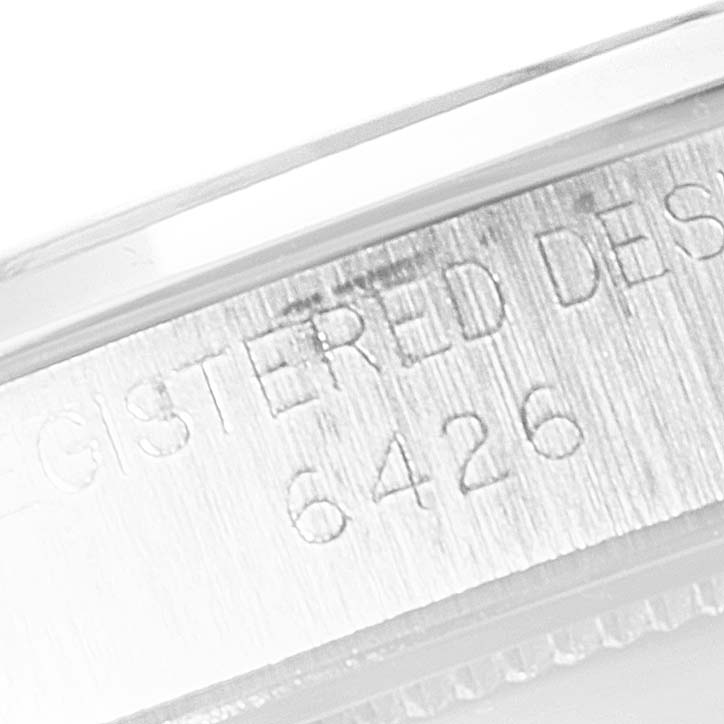 This image shows a close-up of the case back edge of the Rolex Vintage Collection 6426 Men's Stainless Steel Silver Dial 6426 Men's Stainless Steel Silver Dial model, displaying the engraved text and reference number 6426.