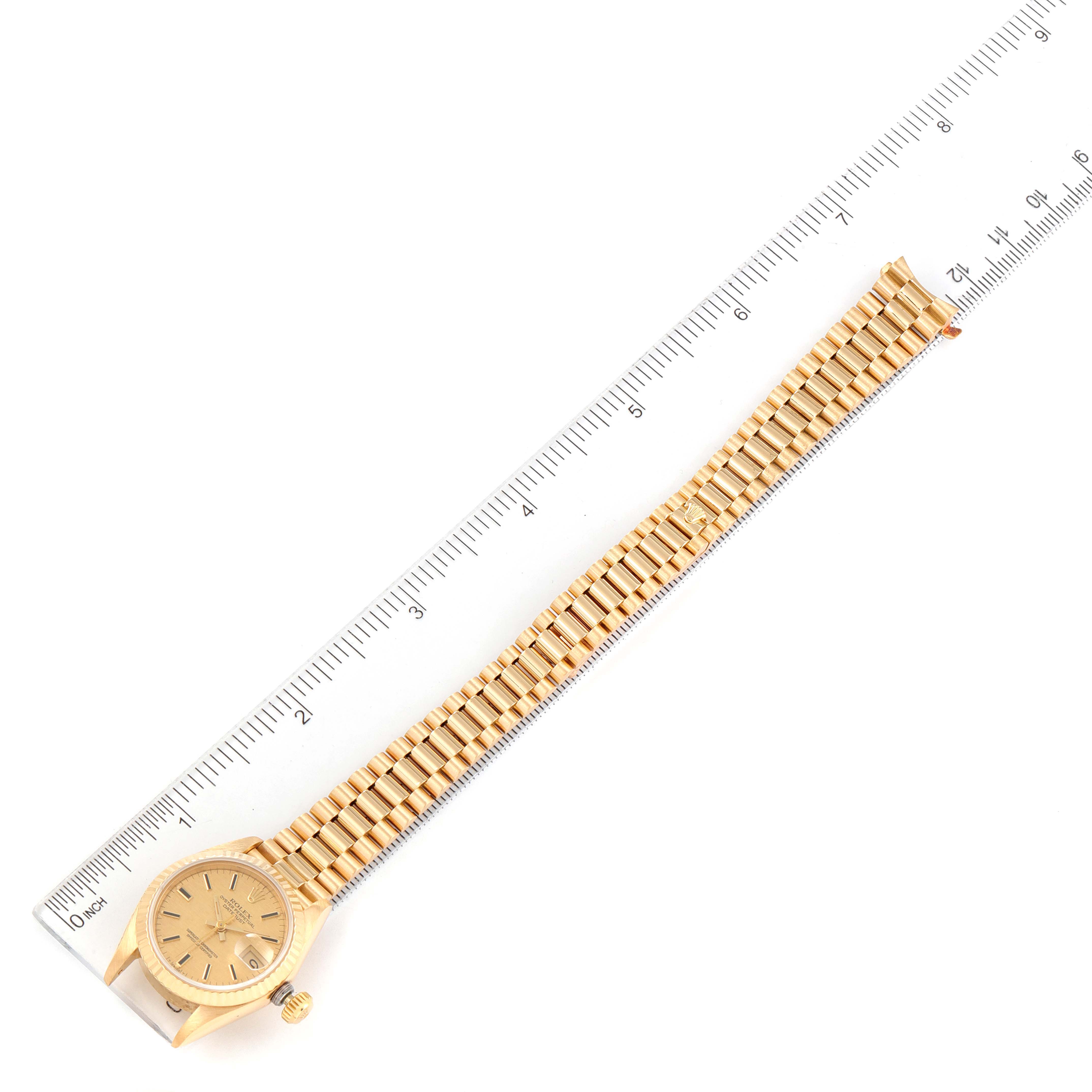 The Rolex President 69178 Women
s Yellow Gold Champagne Dial 69178 Women
s Yellow Gold Champagne Dial model watch is shown from a top-down angle, displaying its dial, case, and full bracelet.