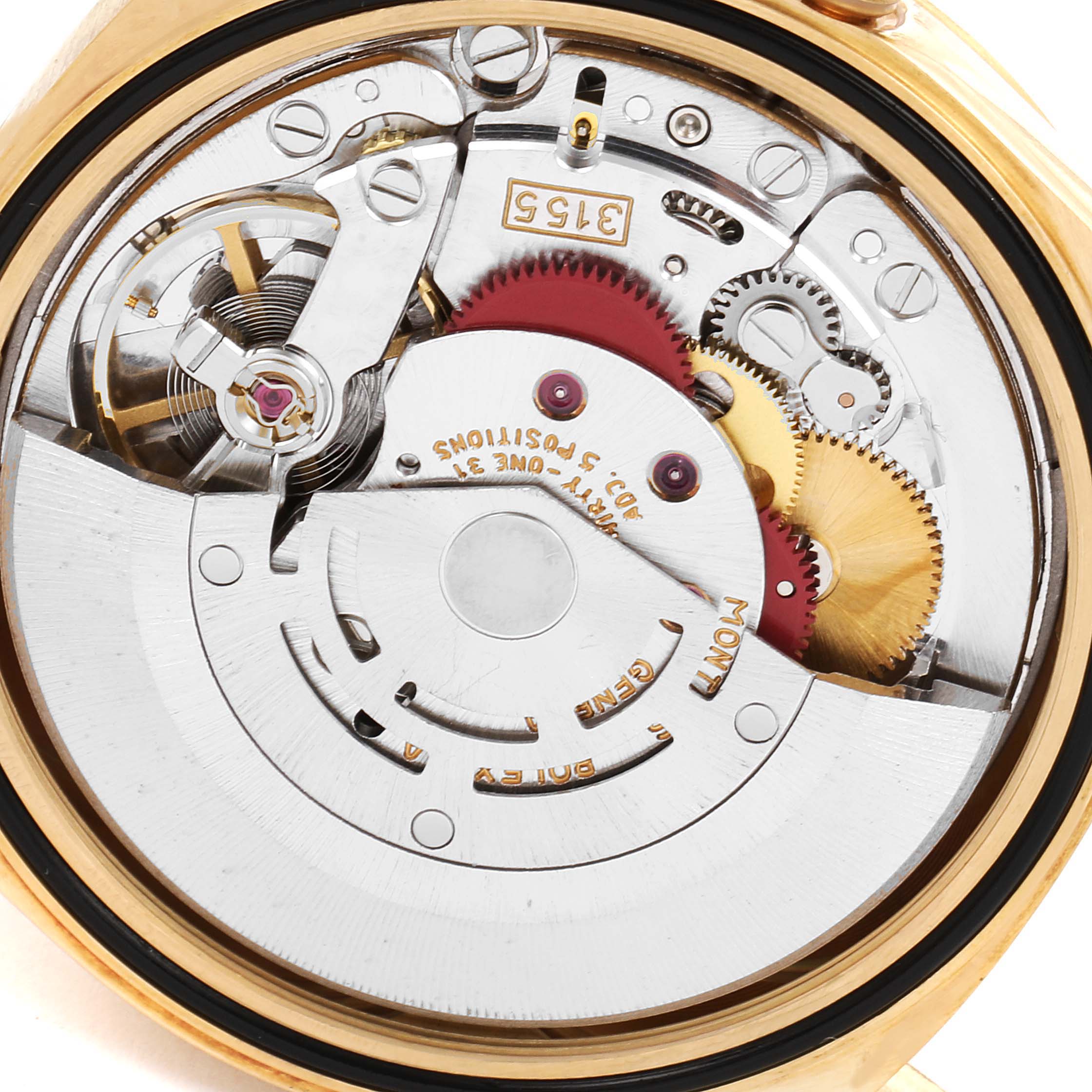 This image shows the internal movement and intricate gears of the Rolex President 18238 Men's Yellow Gold Silver Dial 18238 Men's Yellow Gold Silver Dial model watch from a back angle.