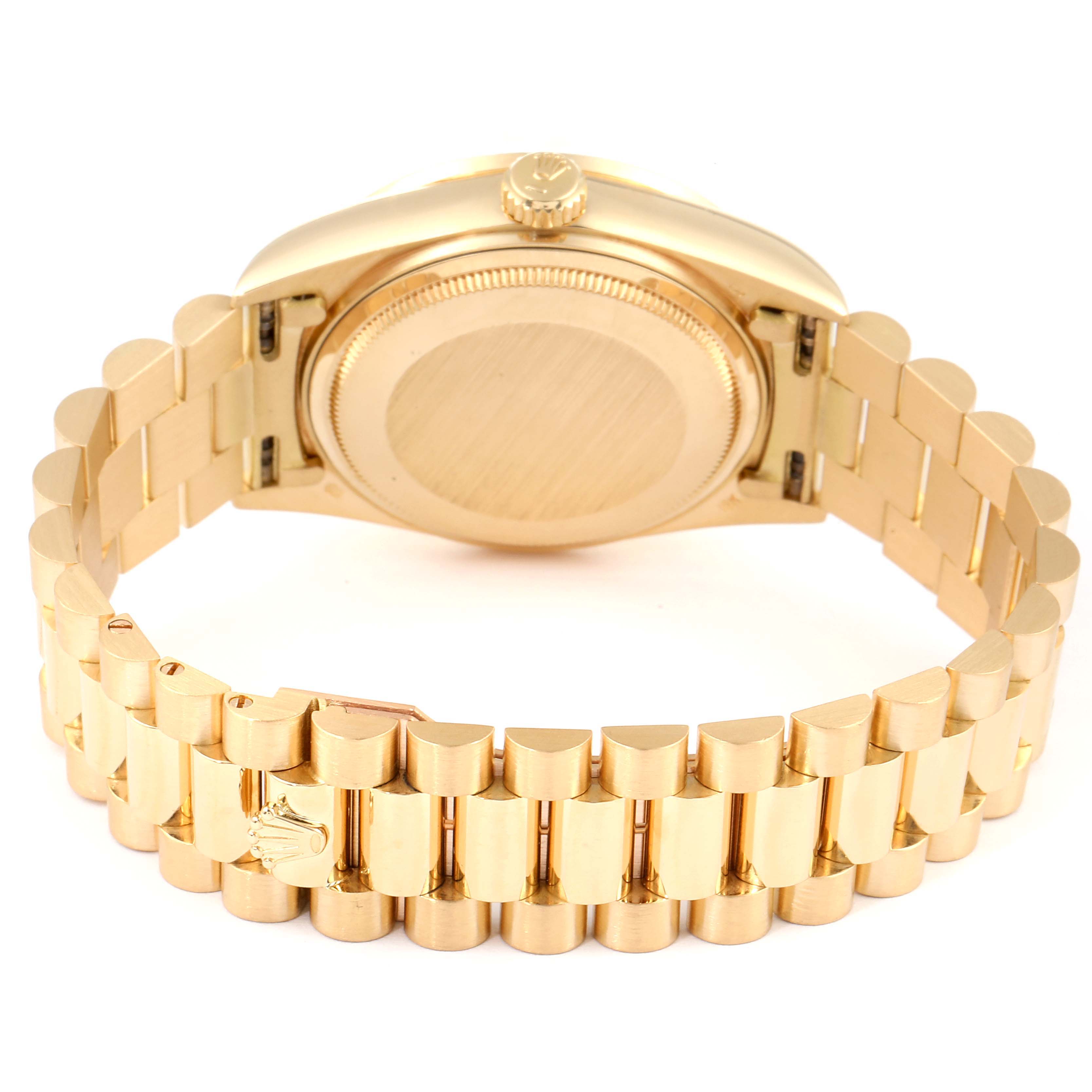 This image shows the backside and bracelet of the Rolex President 18048 Men
s Yellow Gold Champagne Dial 18048 Men
s Yellow Gold Champagne Dial model watch, including the clasp and crown.