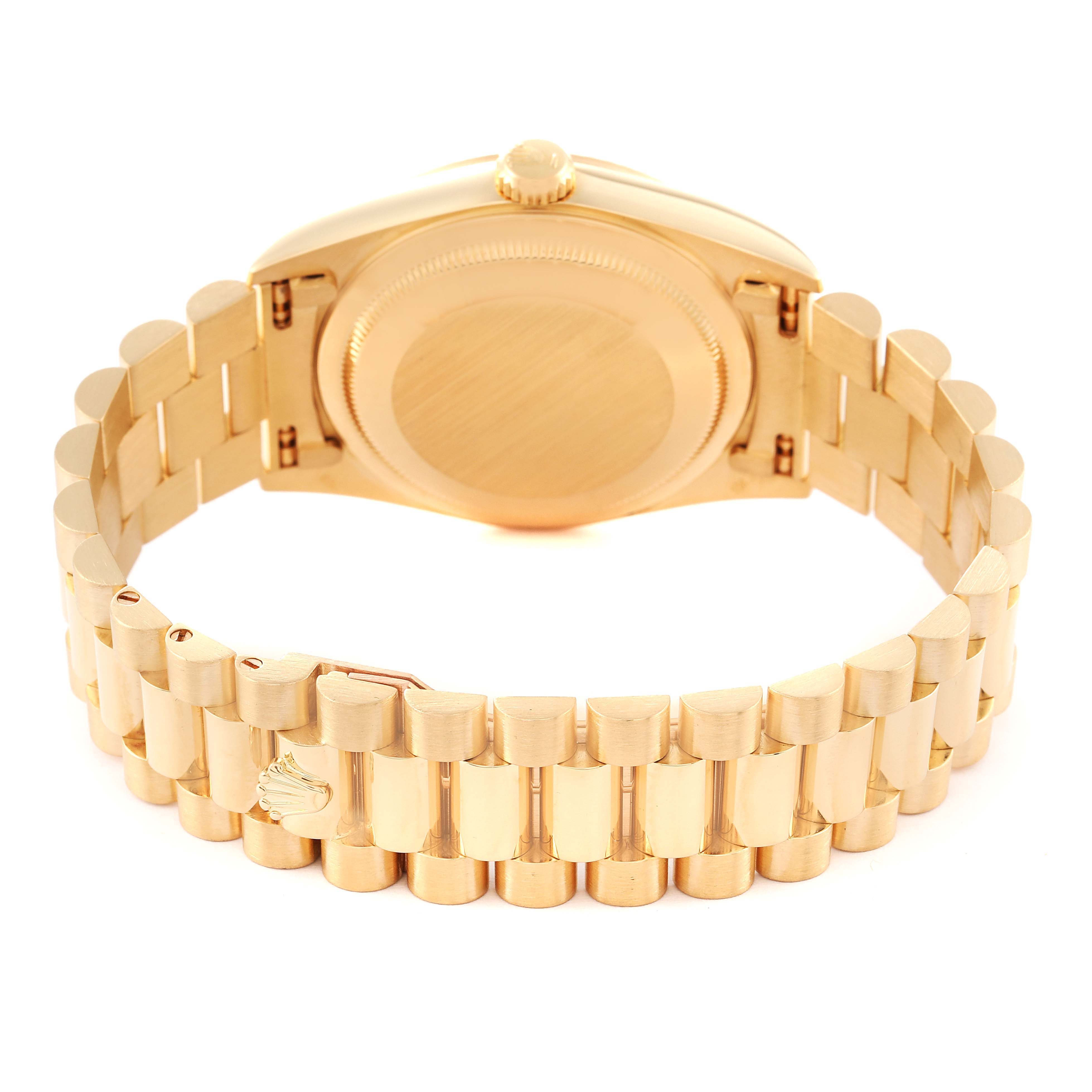 This image shows the back and bracelet of a Rolex President 18338 Men
s Yellow Gold Champagne Dial 18338 Men
s Yellow Gold Champagne Dial model watch from a slightly elevated angle.