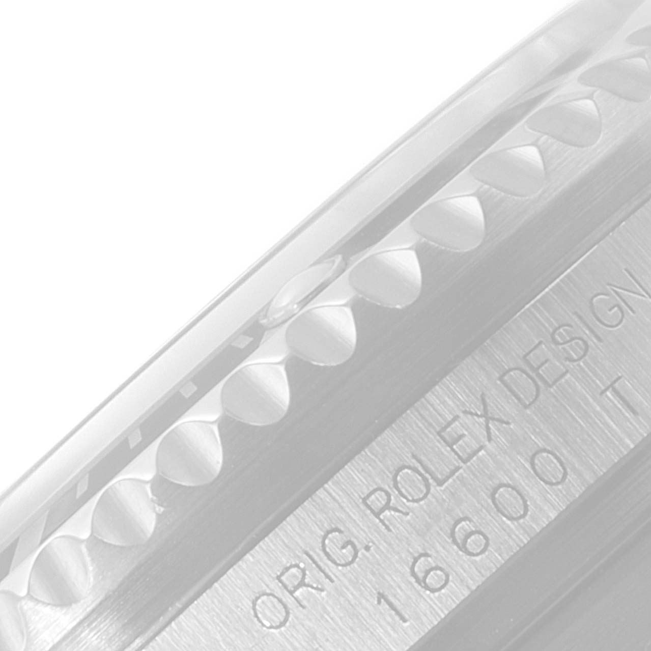 This image shows a close-up of the case and bezel of a Rolex Sea-Dweller 16600 Men
s Stainless Steel Black Dial 16600 Men
s Stainless Steel Black Dial model, displaying the etched design details.