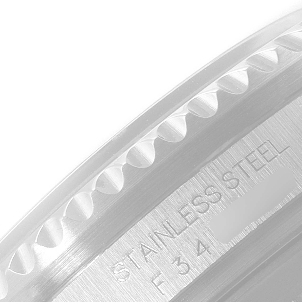 This close-up image shows the caseback edge with "Stainless Steel" inscription on a Rolex Sea-Dweller 16600 Men
s Stainless Steel Black Dial 16600 Men
s Stainless Steel Black Dial model.