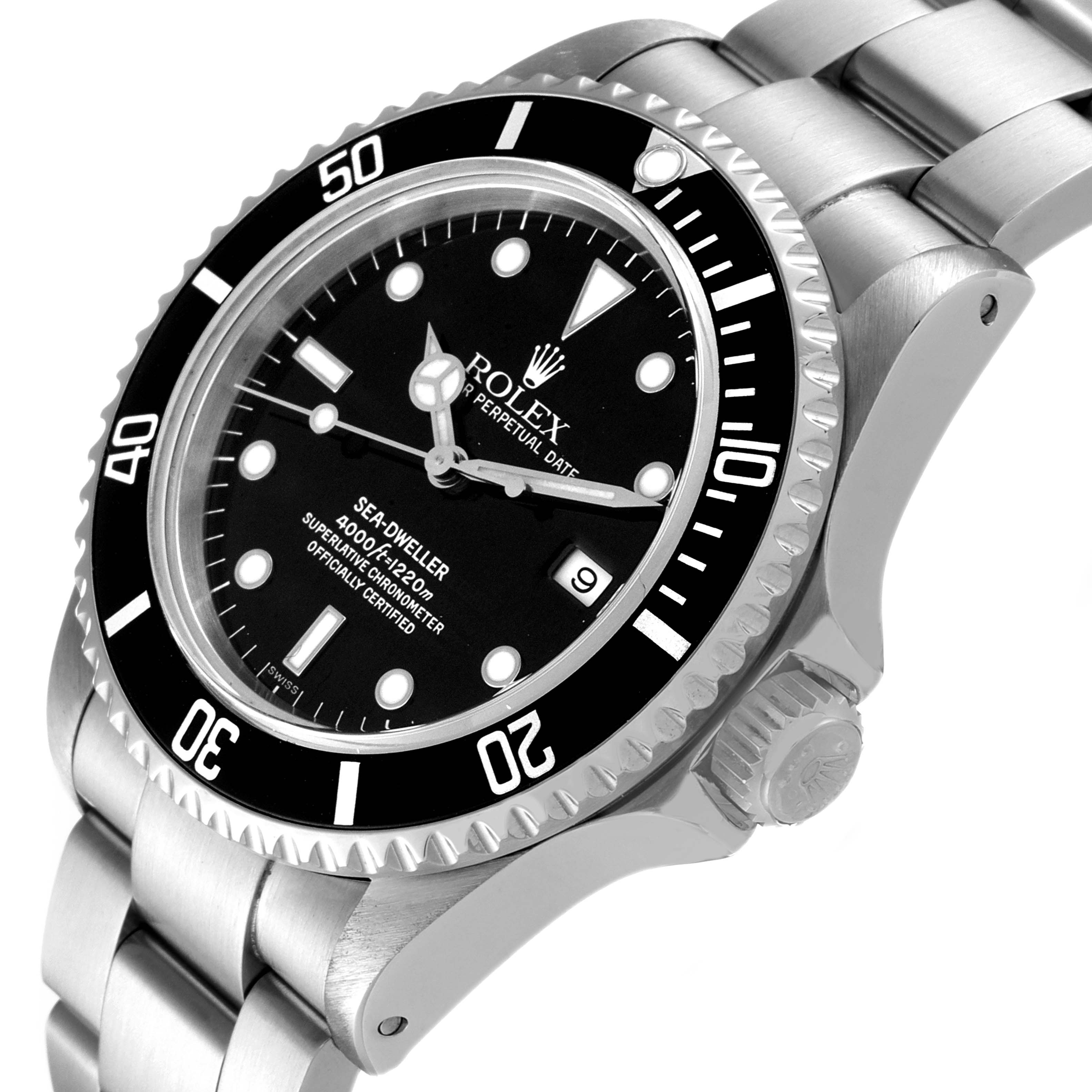 This Rolex Sea-Dweller 16600 Men
s Stainless Steel Black Dial 16600 Men
s Stainless Steel Black Dial watch is shown at a three-quarter angle, highlighting the dial, bezel, crown, and part of the bracelet.
