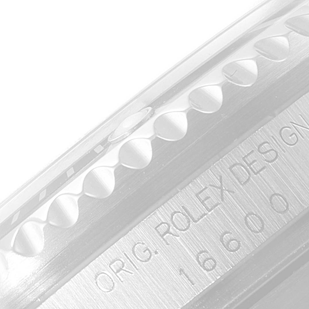 This image shows a close-up of the bezel and model engraving on the side of a Rolex Sea-Dweller 16600 Men
s Stainless Steel Black Dial 16600 Men
s Stainless Steel Black Dial watch.