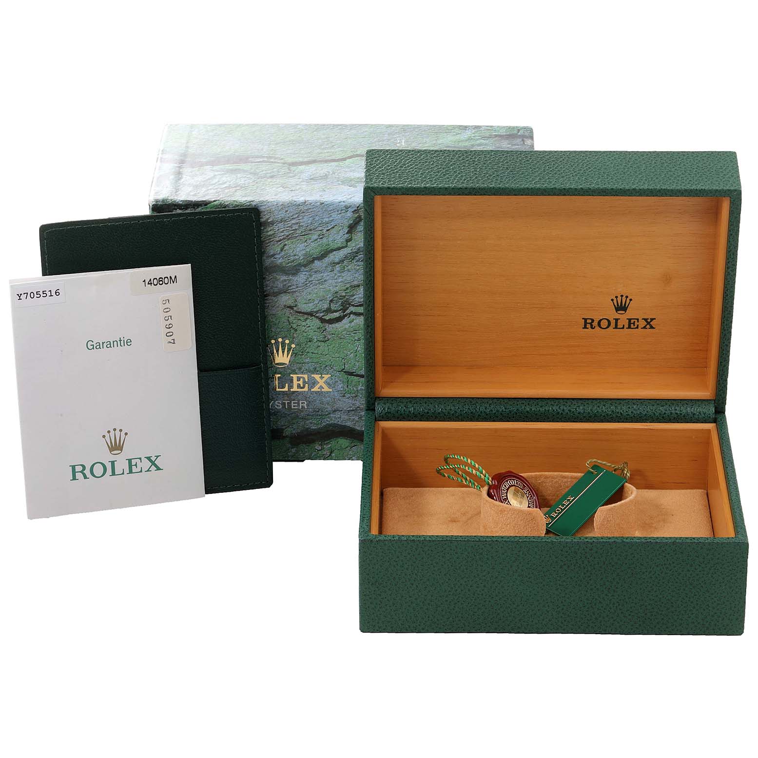 The image shows the packaging, warranty booklet, and tag accessories for the Rolex Submariner 14060 Men
s Stainless Steel Black Dial 14060 Men
s Stainless Steel Black Dial model.