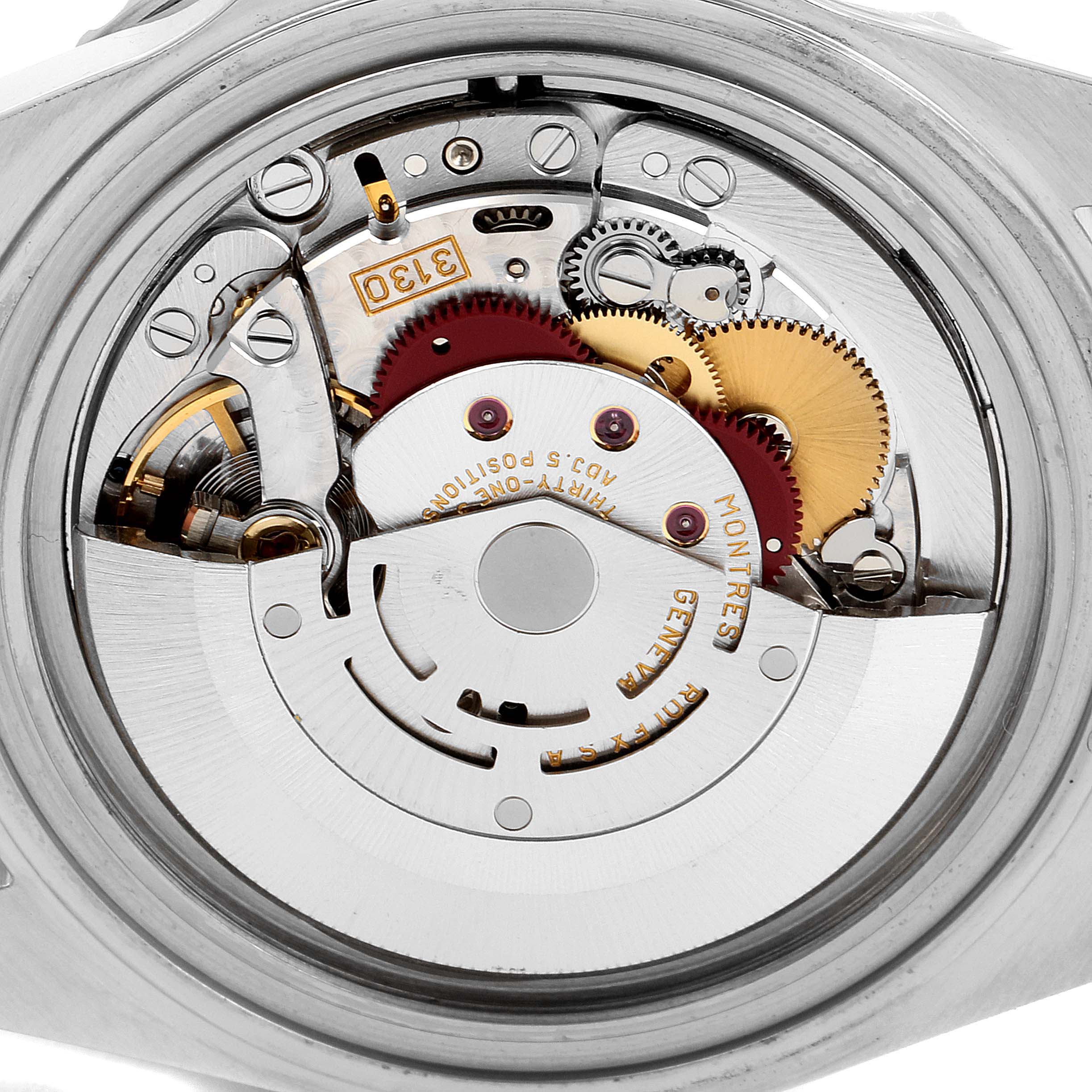 This is an image showing the movement mechanism of a Rolex Submariner 14060 Men's Stainless Steel Black Dial 14060 Men's Stainless Steel Black Dial watch from a rear angle.