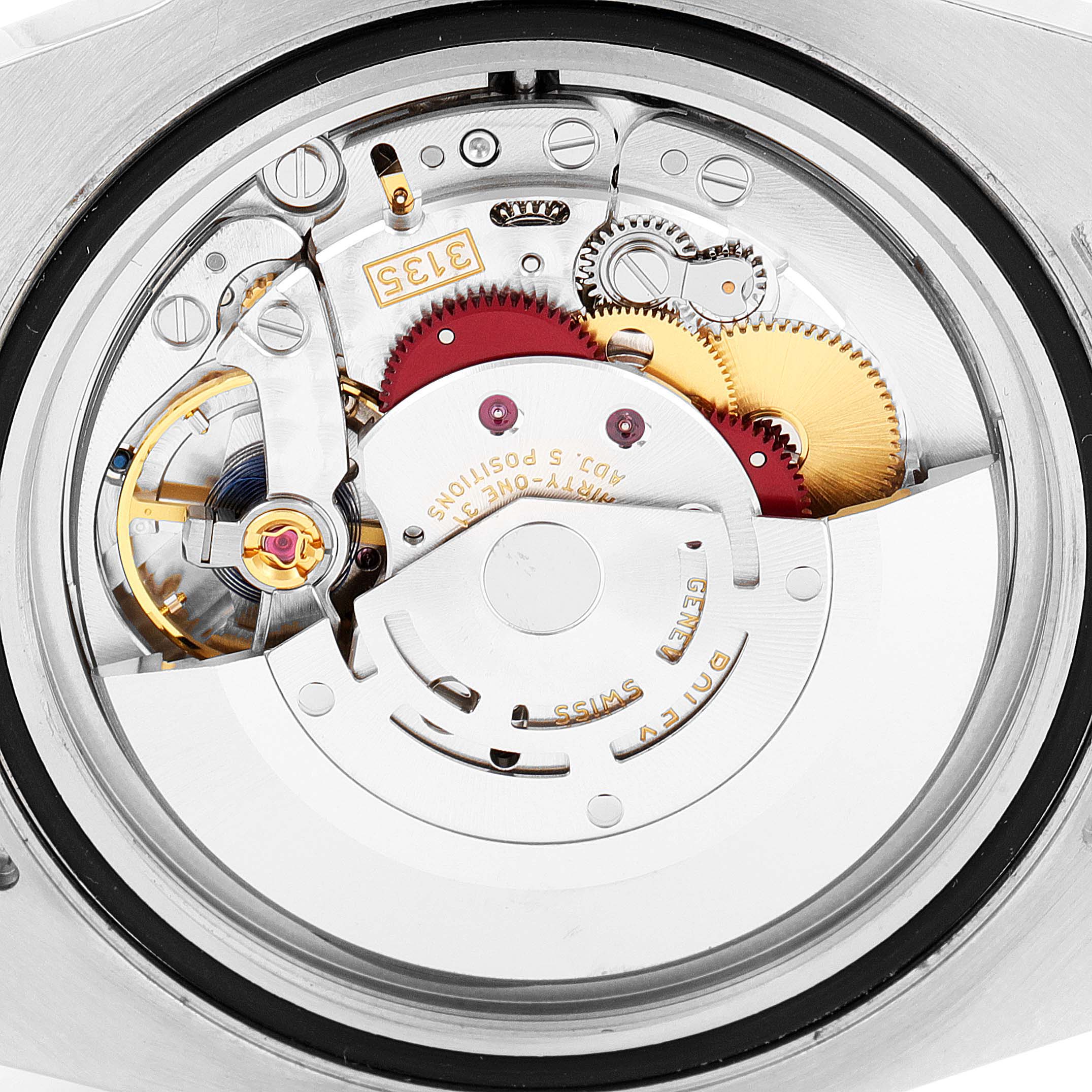 The image shows the internal movement and mechanical components of a Rolex Submariner 116610 Men
s Stainless Steel Black Dial 116610 Men
s Stainless Steel Black Dial watch at a close-up angle.