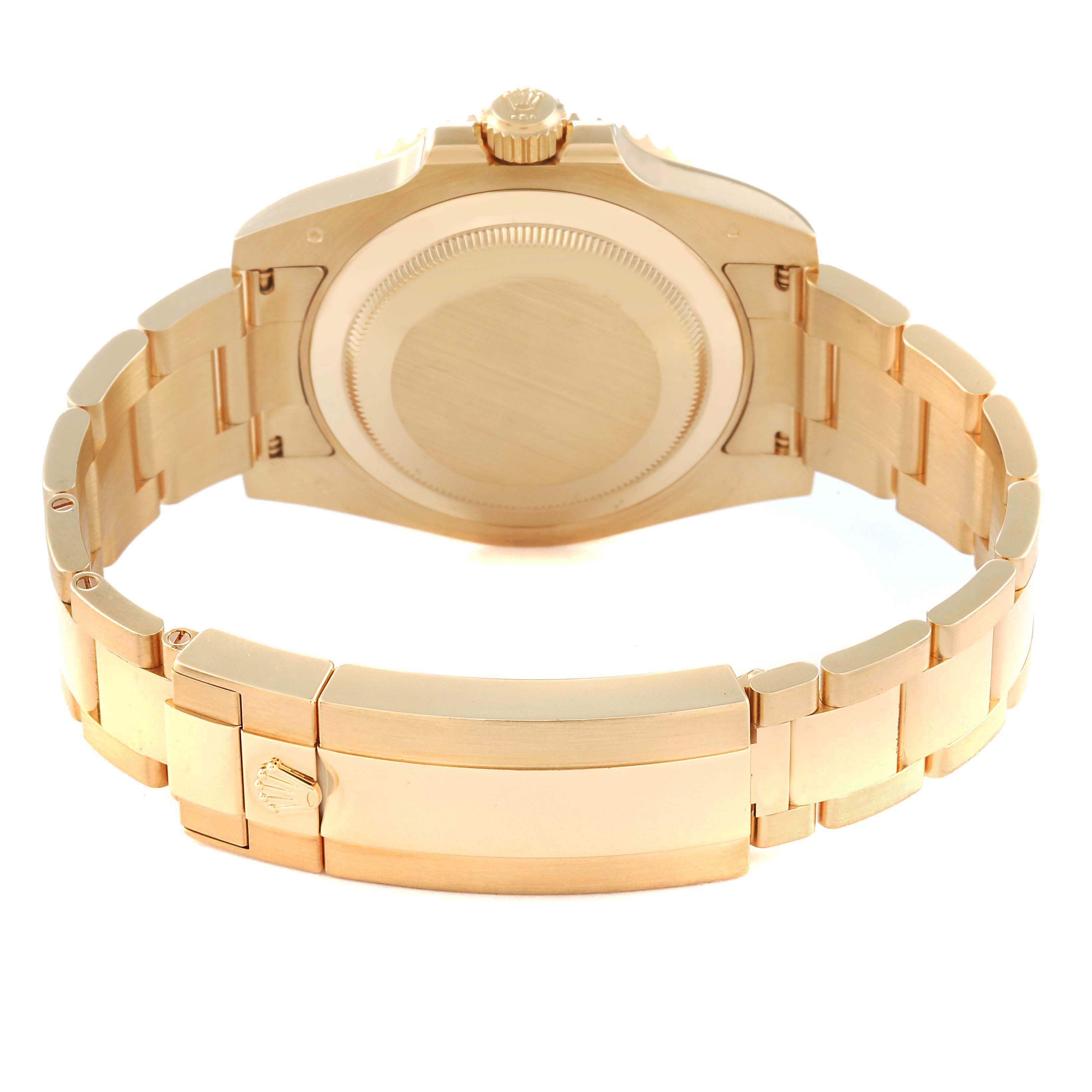 The image shows the back view of a Rolex Submariner 116618LB Men's Yellow Gold Blue Dial 116618LB Men's Yellow Gold Blue Dial watch, including the case back, bracelet, and clasp.