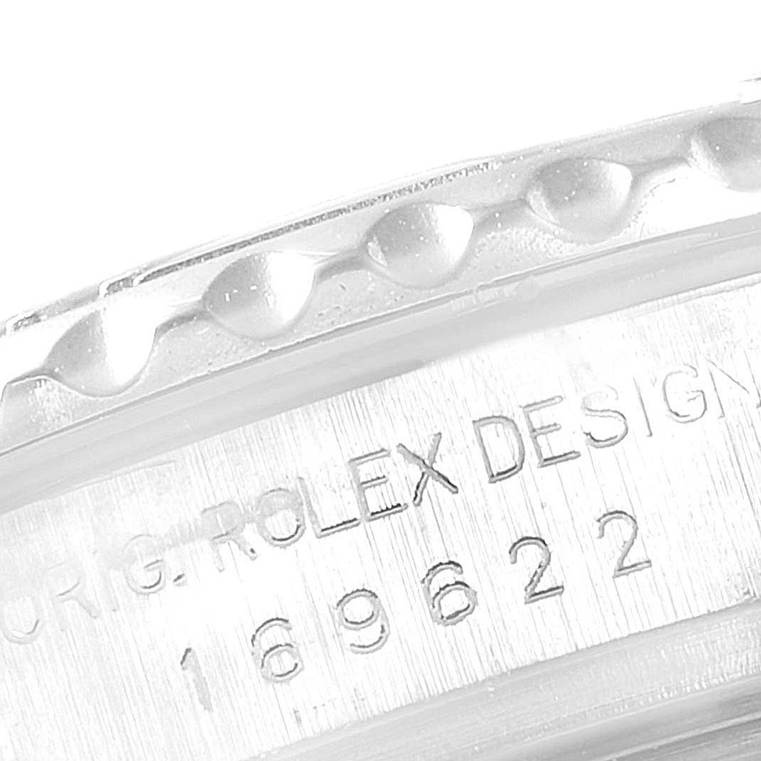 The image shows a close-up of the case side of a Rolex Yacht-Master 169622 Women's Stainless Steel Silver Dial 169622 Women's Stainless Steel Silver Dial watch, highlighting the model and serial numbers.