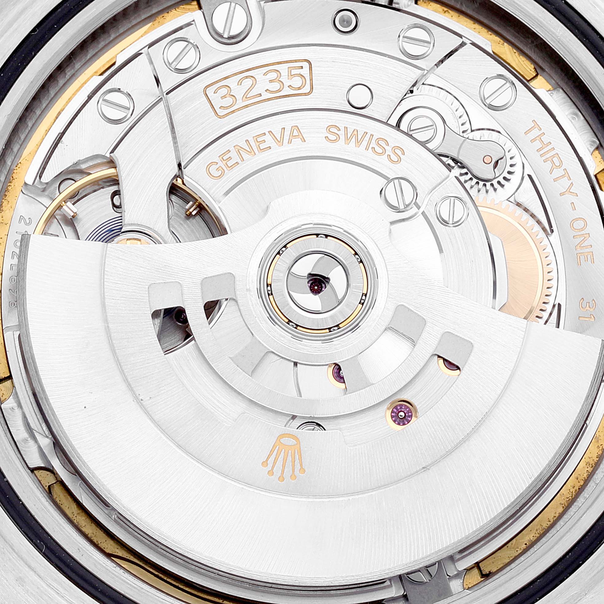 This image shows a close-up of the movement of a Rolex Yacht-Master 226659 Men's White Gold Black Dial 226659 Men's White Gold Black Dial watch, specifically the caliber 3235 mechanism.