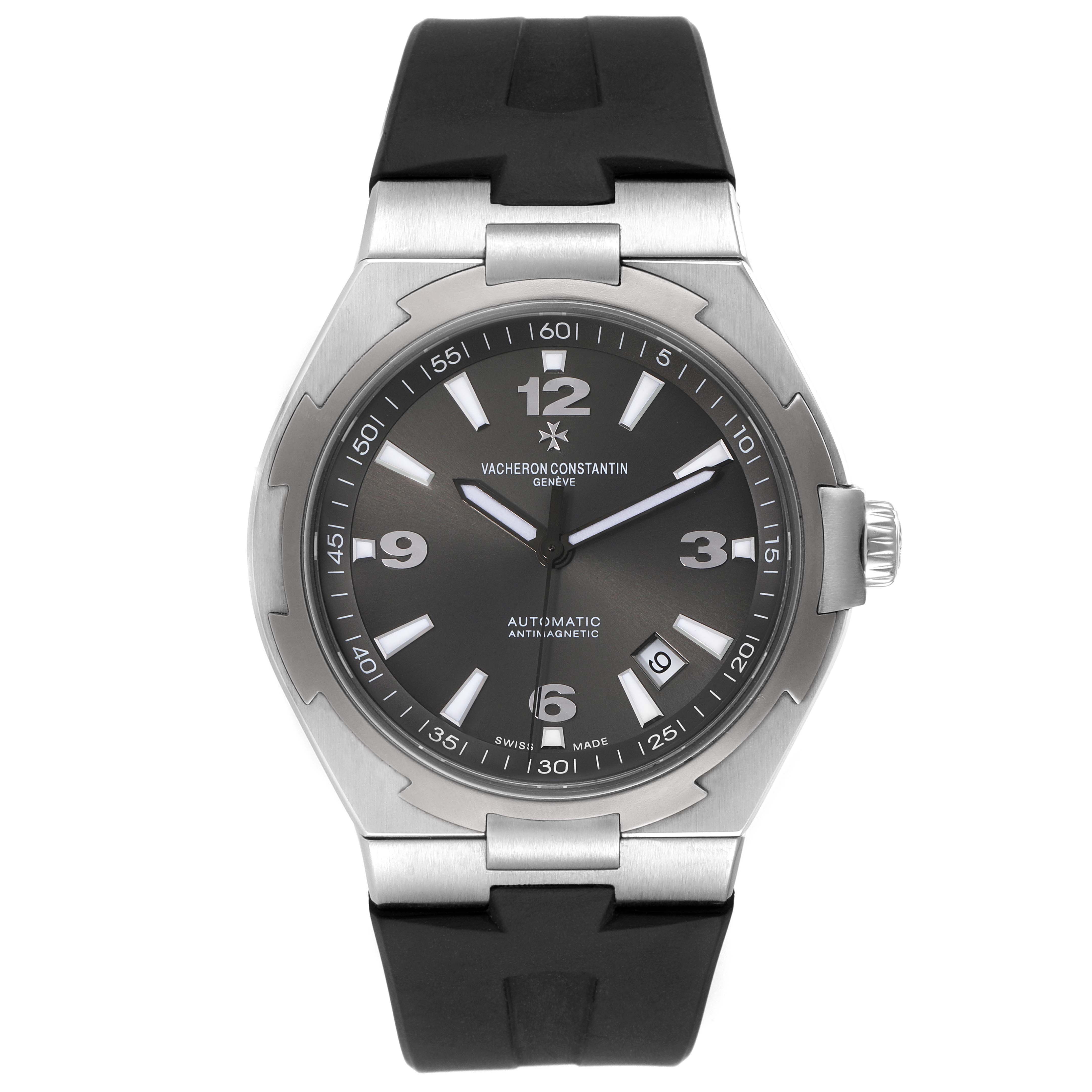 The image shows a front view of the Vacheron Constantin Overseas 47040/000W-9500 Men's Stainless Steel Black Dial 47040/000W-9500 Men's Stainless Steel Black Dial watch, highlighting its dial, bezel, crown, and rubber strap.