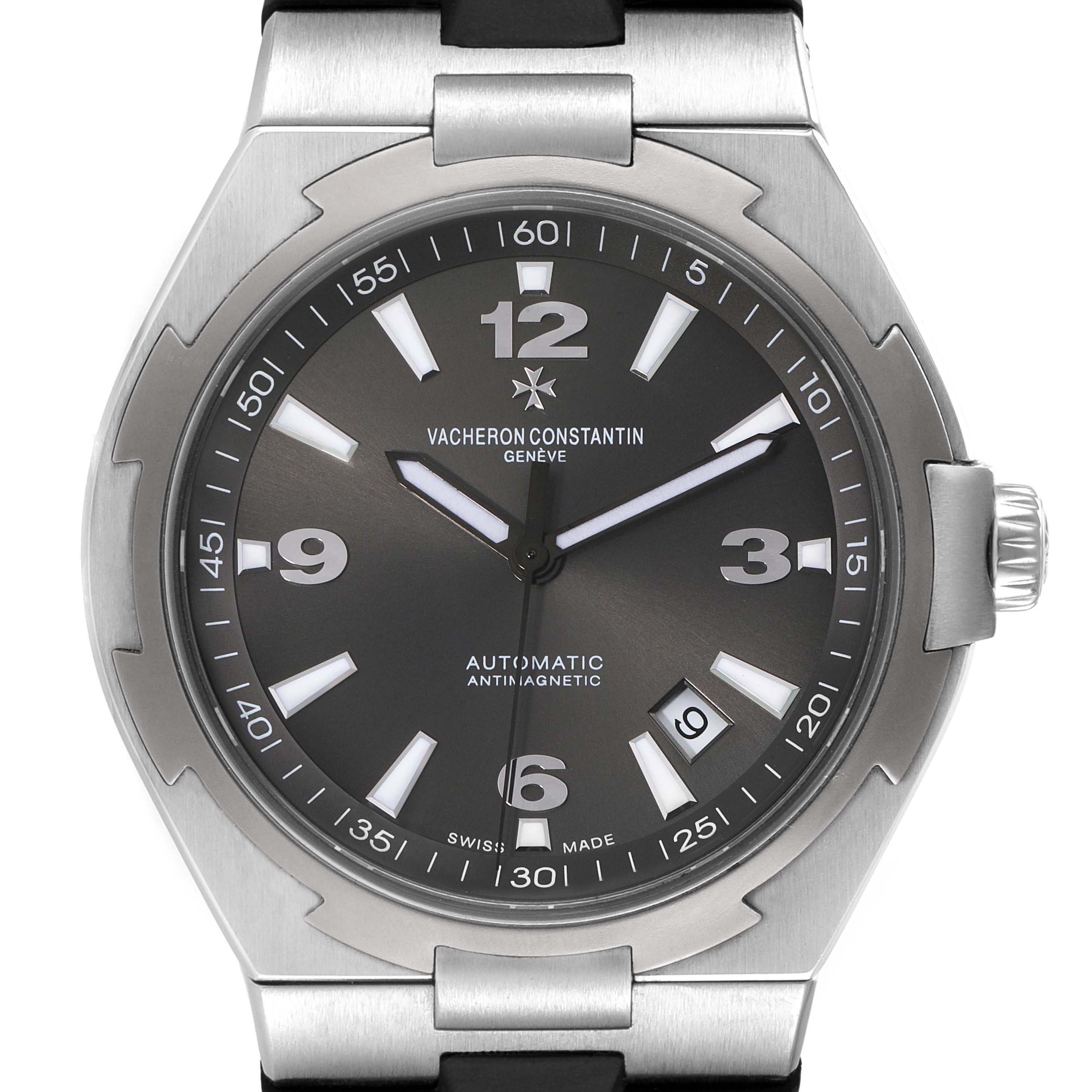 The image shows a front view of the Vacheron Constantin Overseas 47040/000W-9500 Men's Stainless Steel Black Dial 47040/000W-9500 Men's Stainless Steel Black Dial watch, highlighting the dial, bezel, and crown.