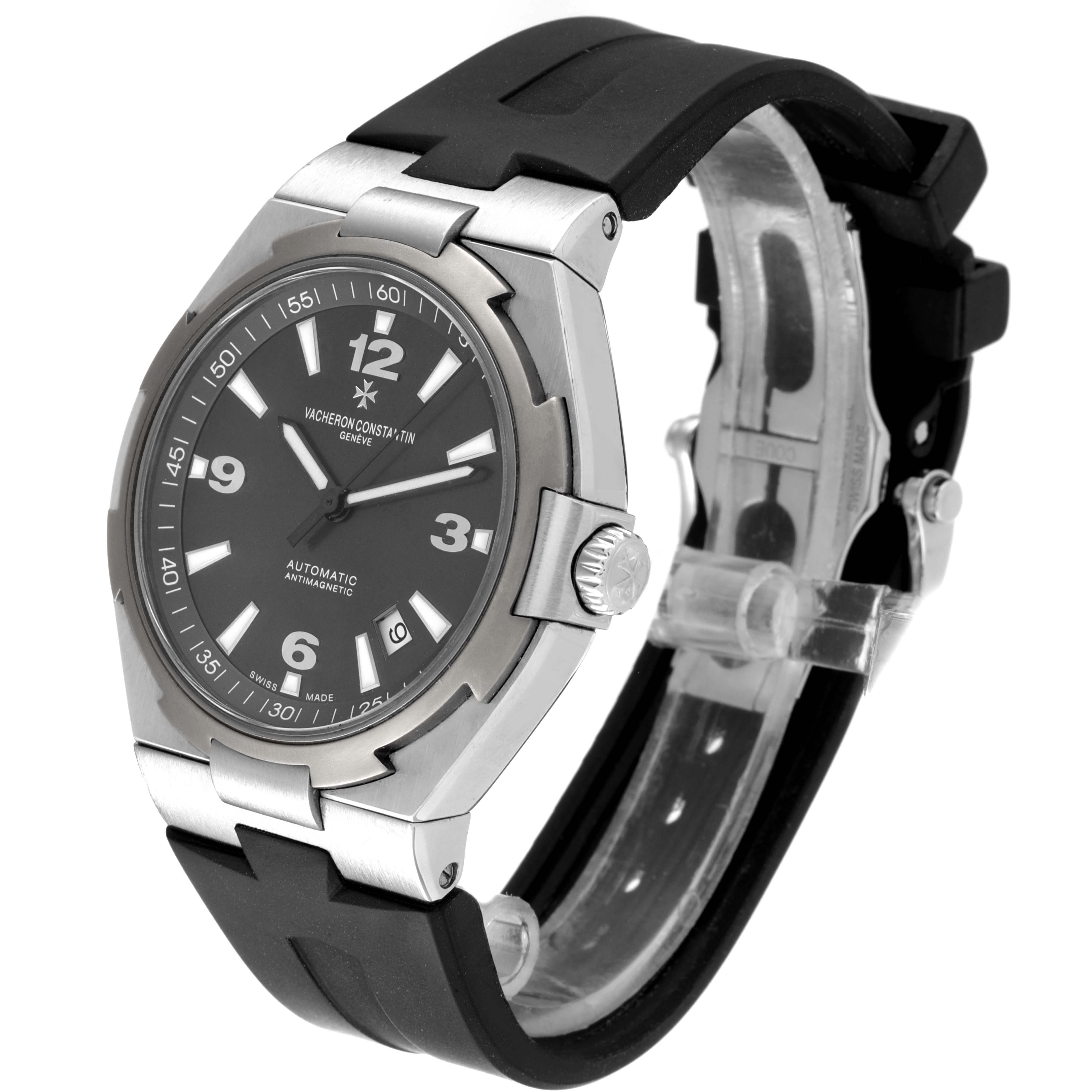 The image shows a side view of the Vacheron Constantin Overseas 47040/000W-9500 Men's Stainless Steel Black Dial 47040/000W-9500 Men's Stainless Steel Black Dial watch, featuring its face, bezel, case, and rubber strap.