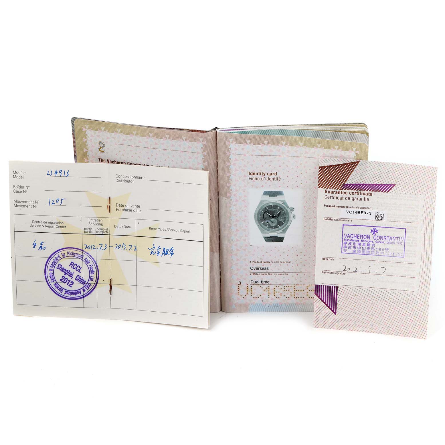 The image shows the documents, identity card, and guarantee certificate for the Vacheron Constantin Overseas 47450/000W-9511 Men's Stainless Steel Grey Dial 47450/000W-9511 Men's Stainless Steel Grey Dial model watch.