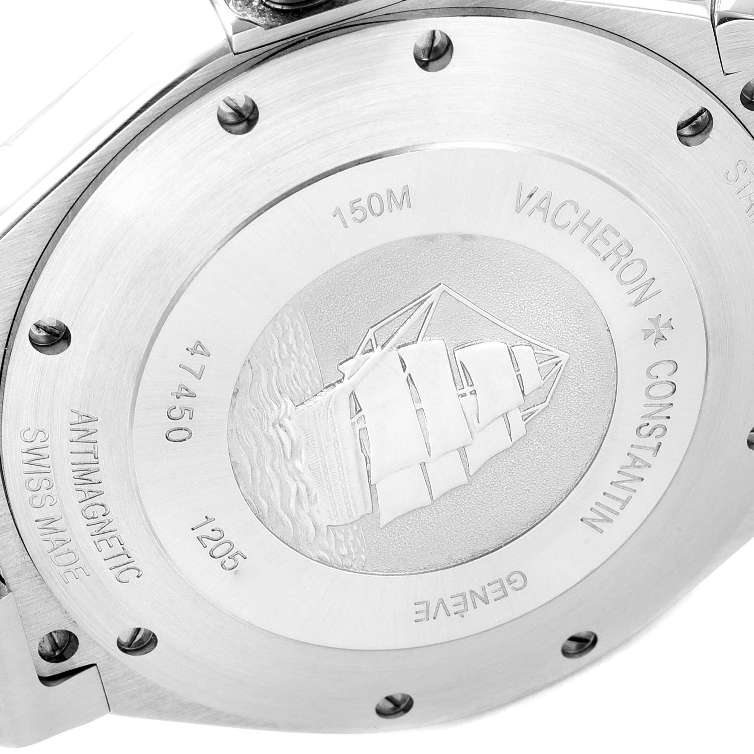 The image shows the stainless steel case back of the Vacheron Constantin Overseas 47450/000W-9511 Men's Stainless Steel Grey Dial 47450/000W-9511 Men's Stainless Steel Grey Dial watch, featuring an engraving of a ship and various inscriptions.