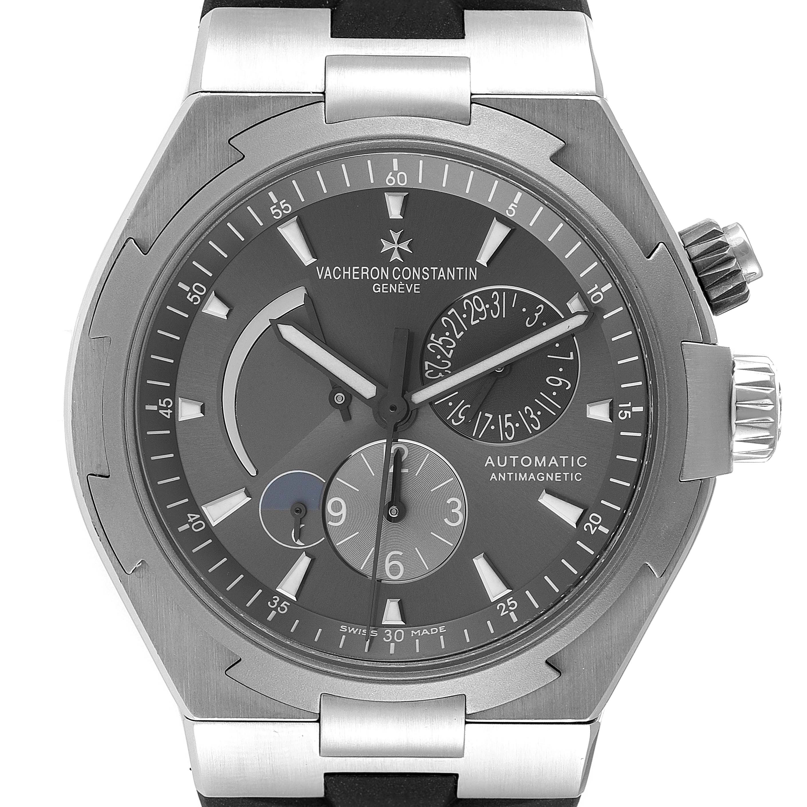 The image shows a front view of the Vacheron Constantin Overseas 47450/000W-9511 Men's Stainless Steel Grey Dial 47450/000W-9511 Men's Stainless Steel Grey Dial watch, highlighting the dial, case, and crown, with visible sub-dials and markers.