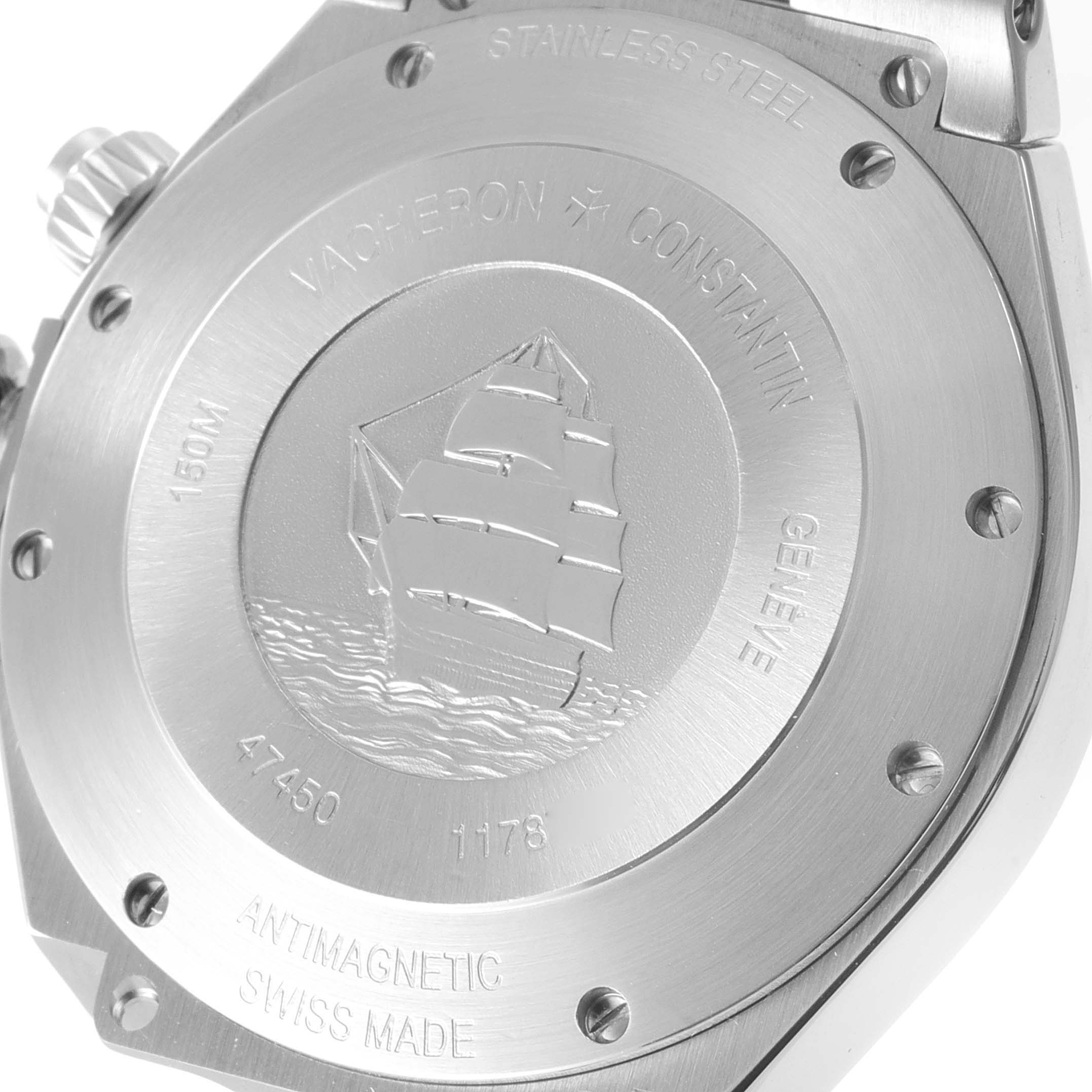The image shows the stainless steel case back of a Vacheron Constantin Overseas 47450/B01A-9226 Men's Stainless Steel Silver Dial 47450/B01A-9226 Men's Stainless Steel Silver Dial watch with a ship engraving and specific model details.