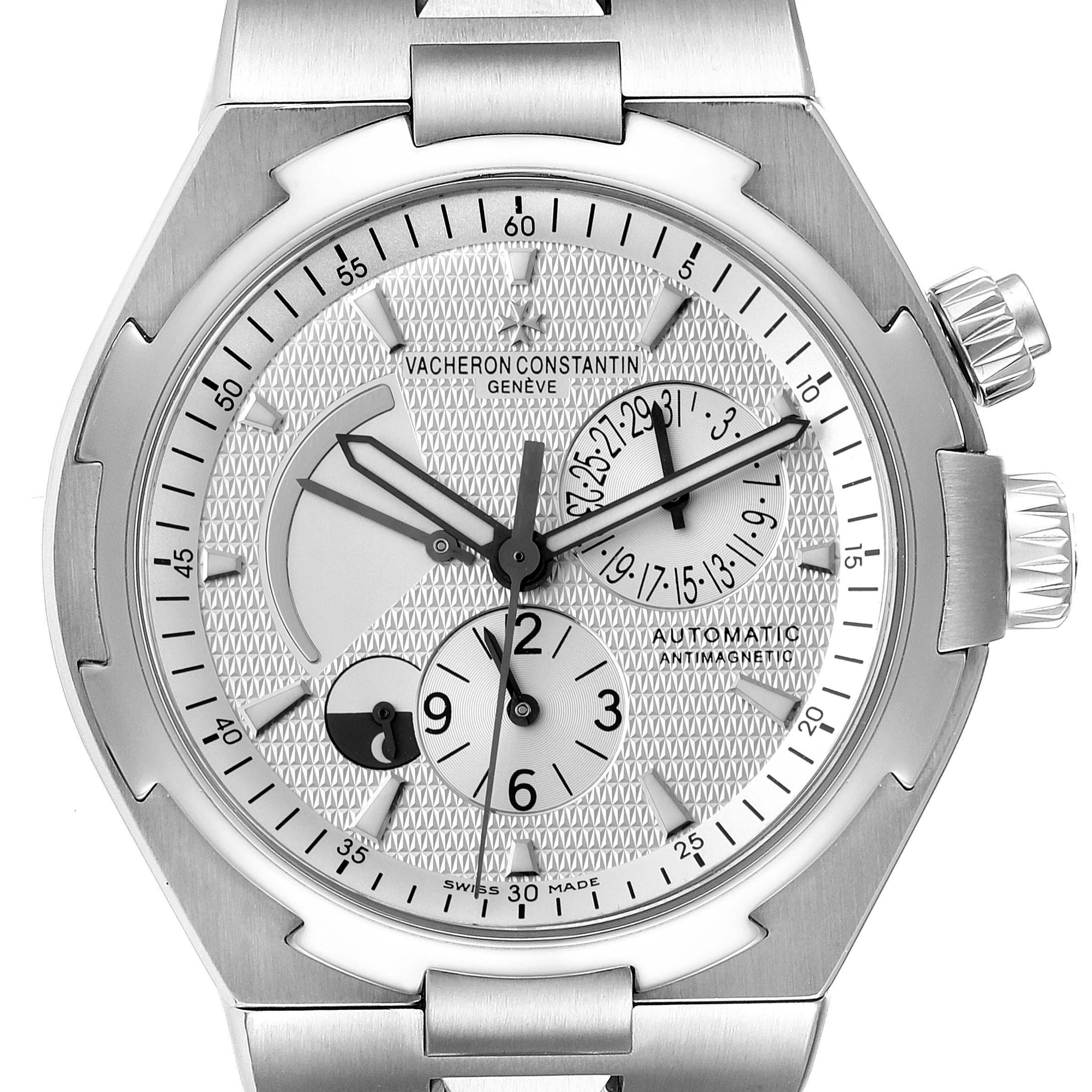 The image shows a front view of the Vacheron Constantin Overseas 47450/B01A-9226 Men's Stainless Steel Silver Dial 47450/B01A-9226 Men's Stainless Steel Silver Dial watch, highlighting the dial, hands, sub-dials, and crown.
