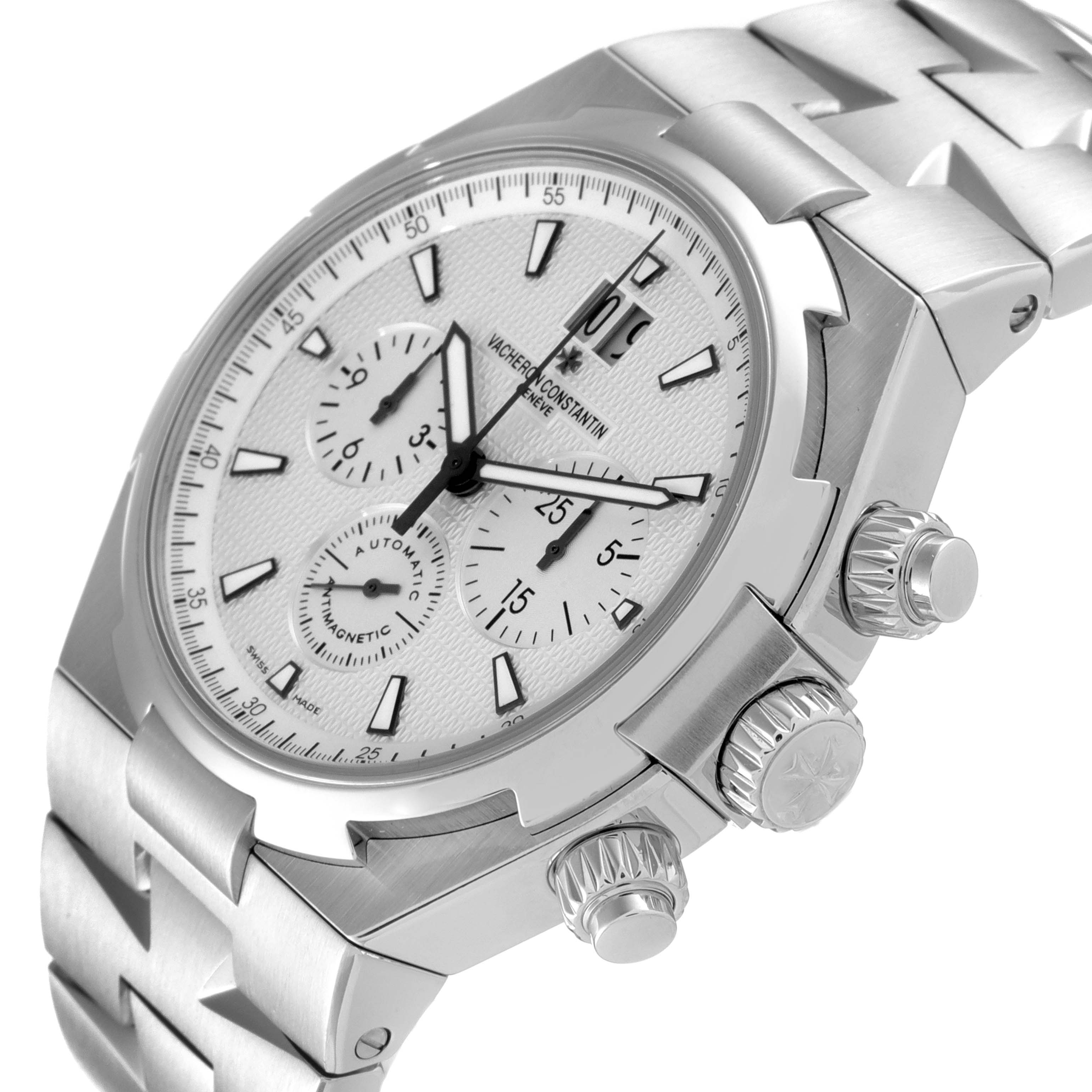 The image shows a close-up side angle of the Vacheron Constantin Overseas 49150/B01A-9095 Men's Stainless Steel Silver Dial 49150/B01A-9095 Men's Stainless Steel Silver Dial watch, highlighting the dial, pushers, crown, and bracelet.