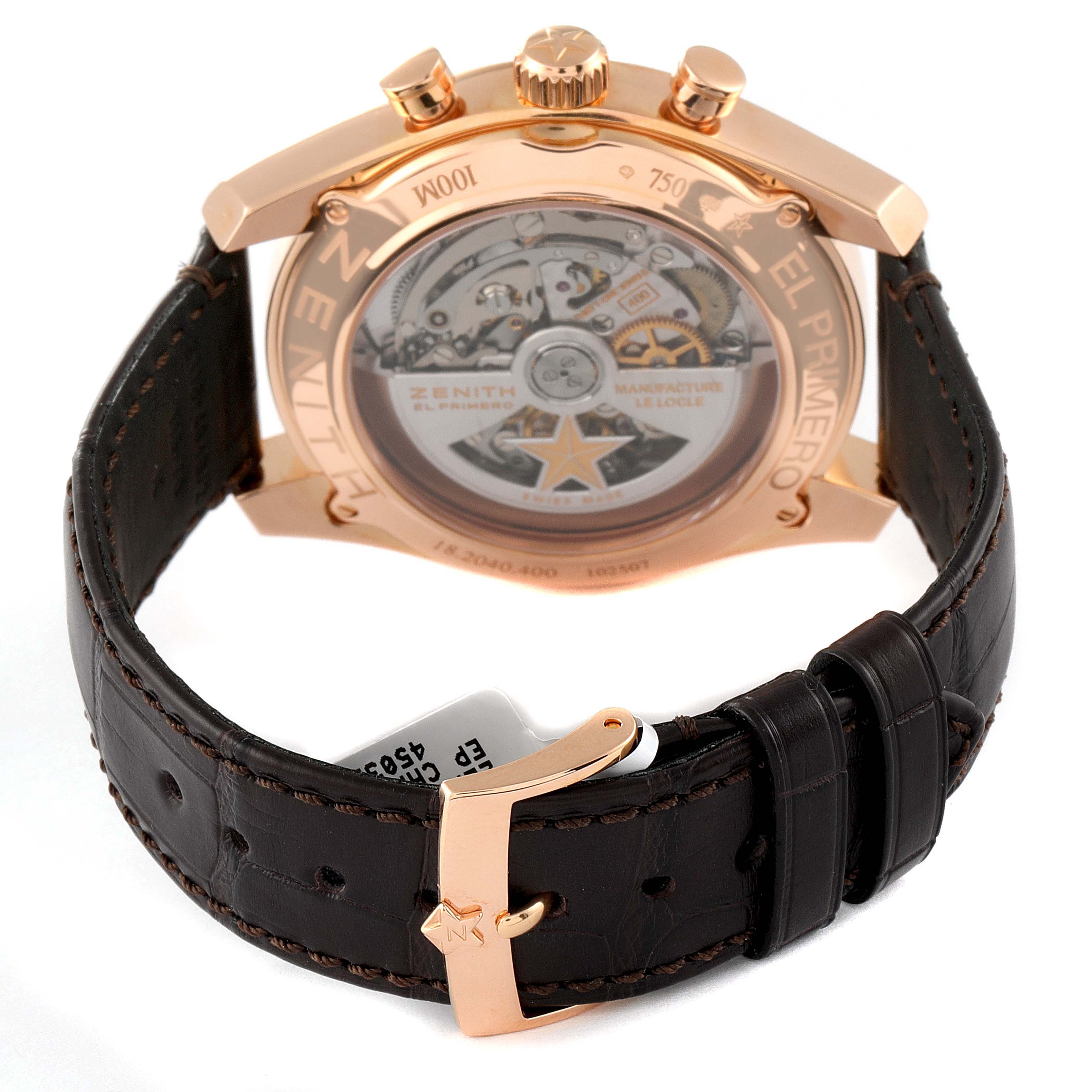 The image shows the Zenith El Primero 18.2040.400/02.C494 Men's Rose Gold Silver Dial 18.2040.400/02.C494 Men's Rose Gold Silver Dial watch from the back, highlighting its movement and leather strap with a buckle.