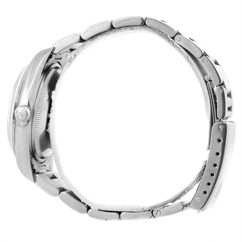 The image shows a side view of a Rolex Date 15200 Men's Stainless Steel Black Dial 15200 Men's Stainless Steel Black Dial model watch, highlighting its side profile, bracelet, and clasp.