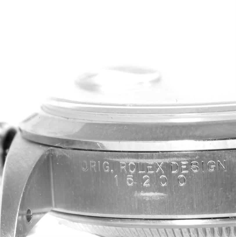 Image shows a close-up of the case side and lugs of a Rolex Date 15200 Men's Stainless Steel Pink Dial 15200 Men's Stainless Steel Pink Dial model, with "ORIG. ROLEX DESIGN 15200" engraved.